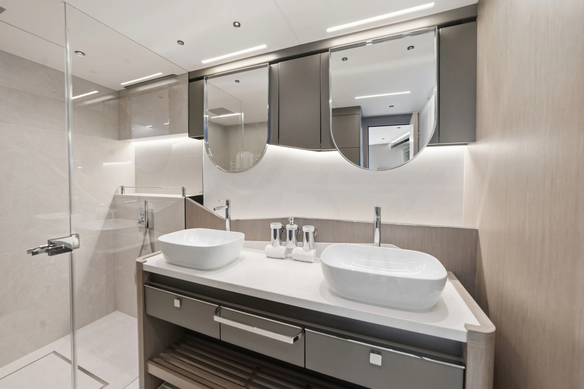 a bathroom with two sinks aboard PURA VIDA Yacht for Sale