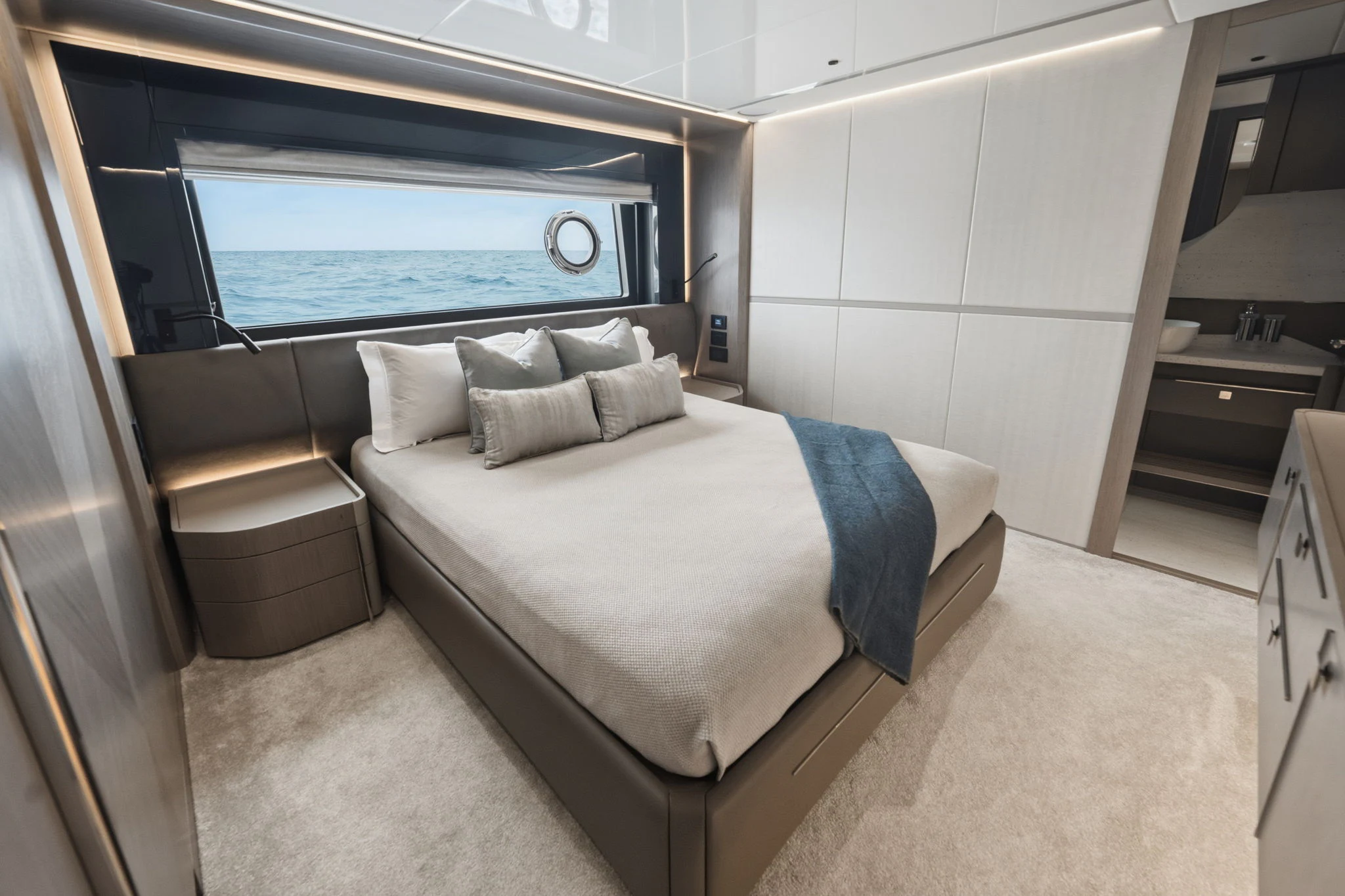a bed in a room aboard PURA VIDA Yacht for Sale