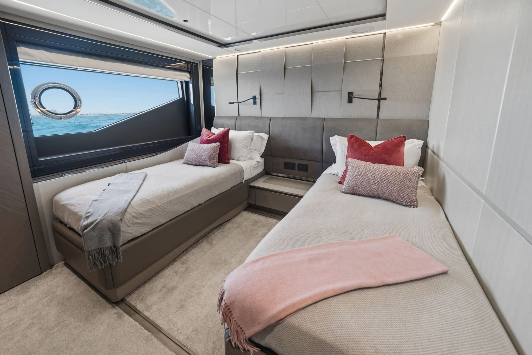 a room with two beds aboard PURA VIDA Yacht for Sale