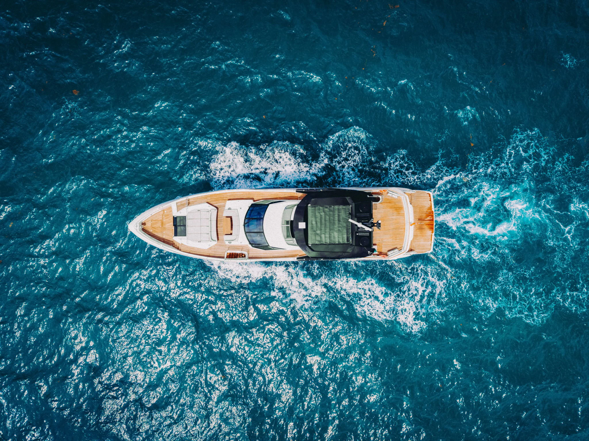 a small boat in the water aboard PURA VIDA Yacht for Sale