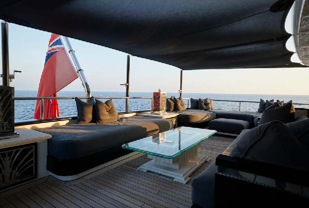 a living room with a large window aboard SILVER ANGEL Yacht for Charter