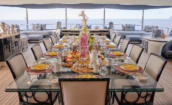 a table set with food aboard SILVER ANGEL Yacht for Charter