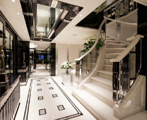 a long hallway with stairs aboard SILVER ANGEL Yacht for Charter