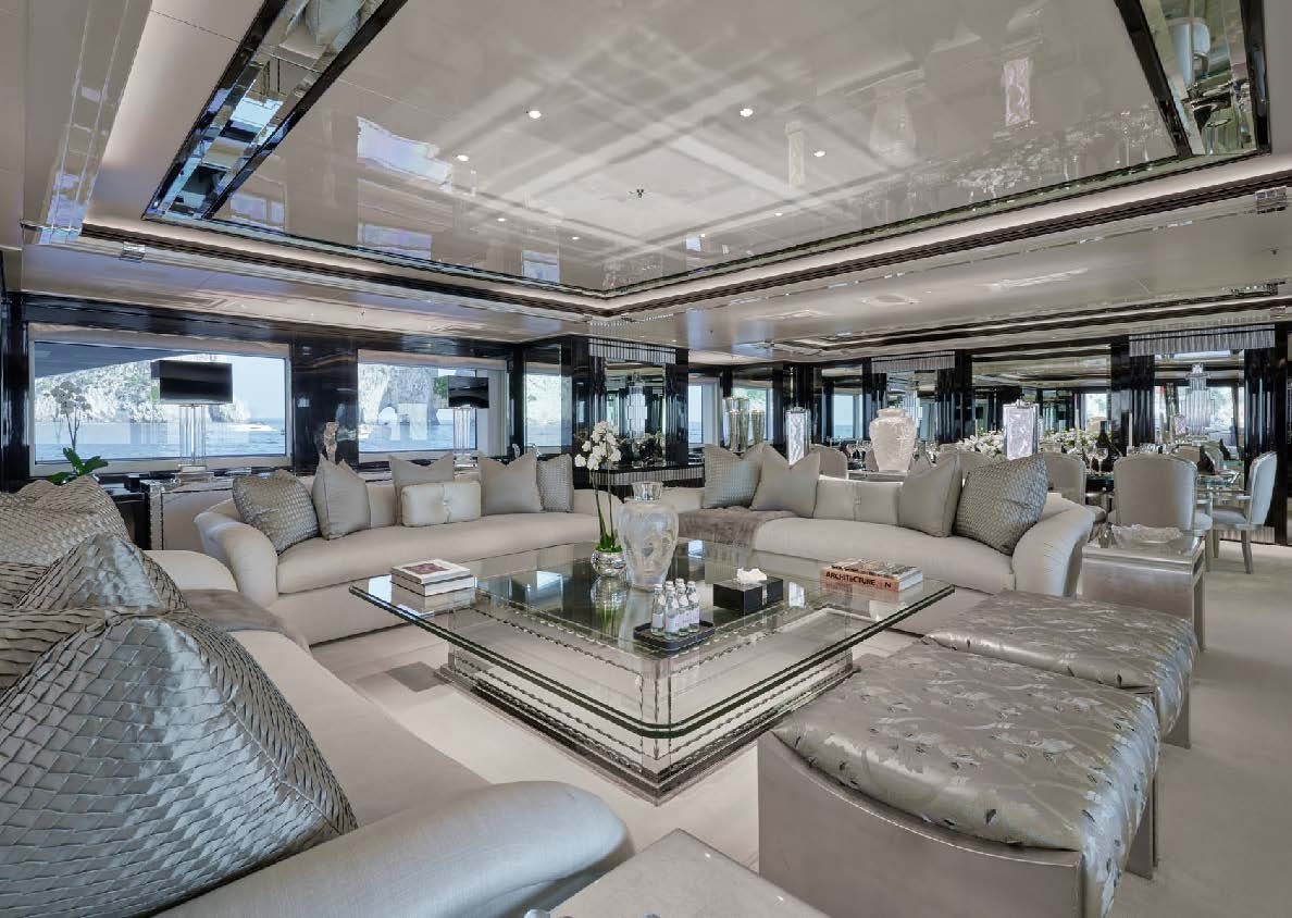 a living room with a large window aboard SILVER ANGEL Yacht for Charter