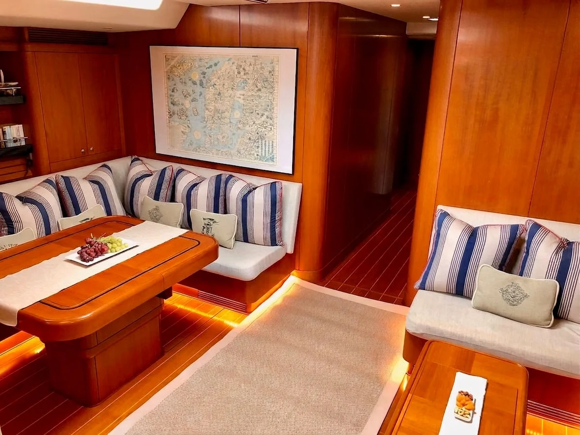 a living room with a couch and a coffee table aboard UNDERLORD Yacht for Sale