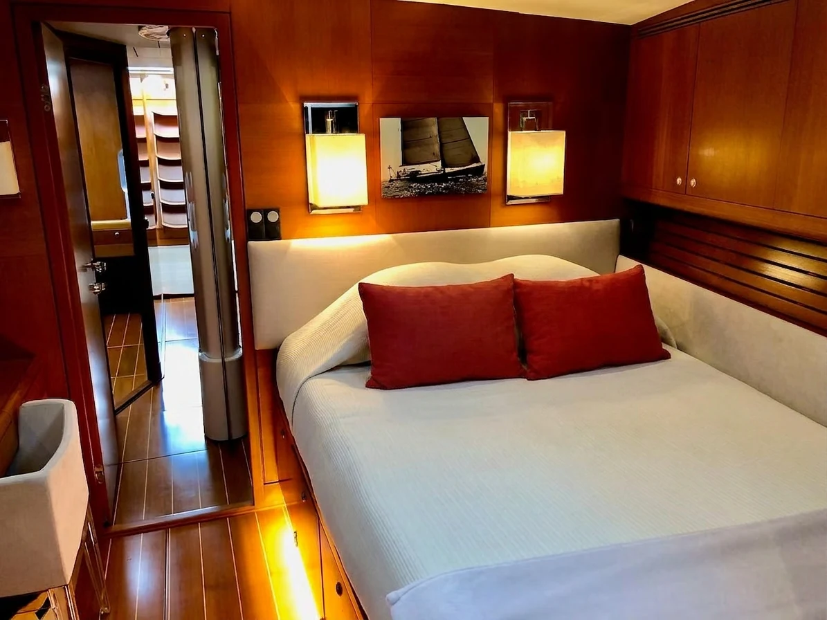 a bed in a room aboard UNDERLORD Yacht for Sale