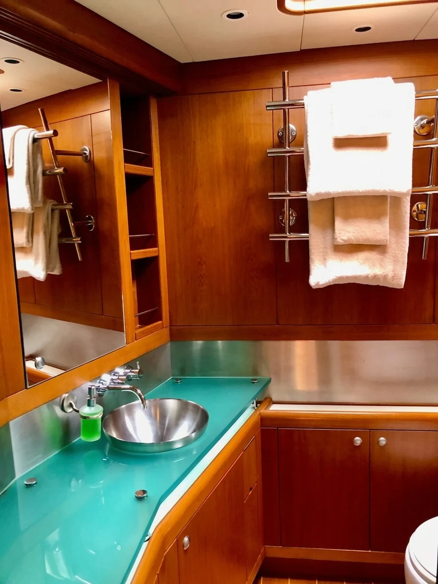 a bathroom with a sink and a mirror aboard UNDERLORD Yacht for Sale