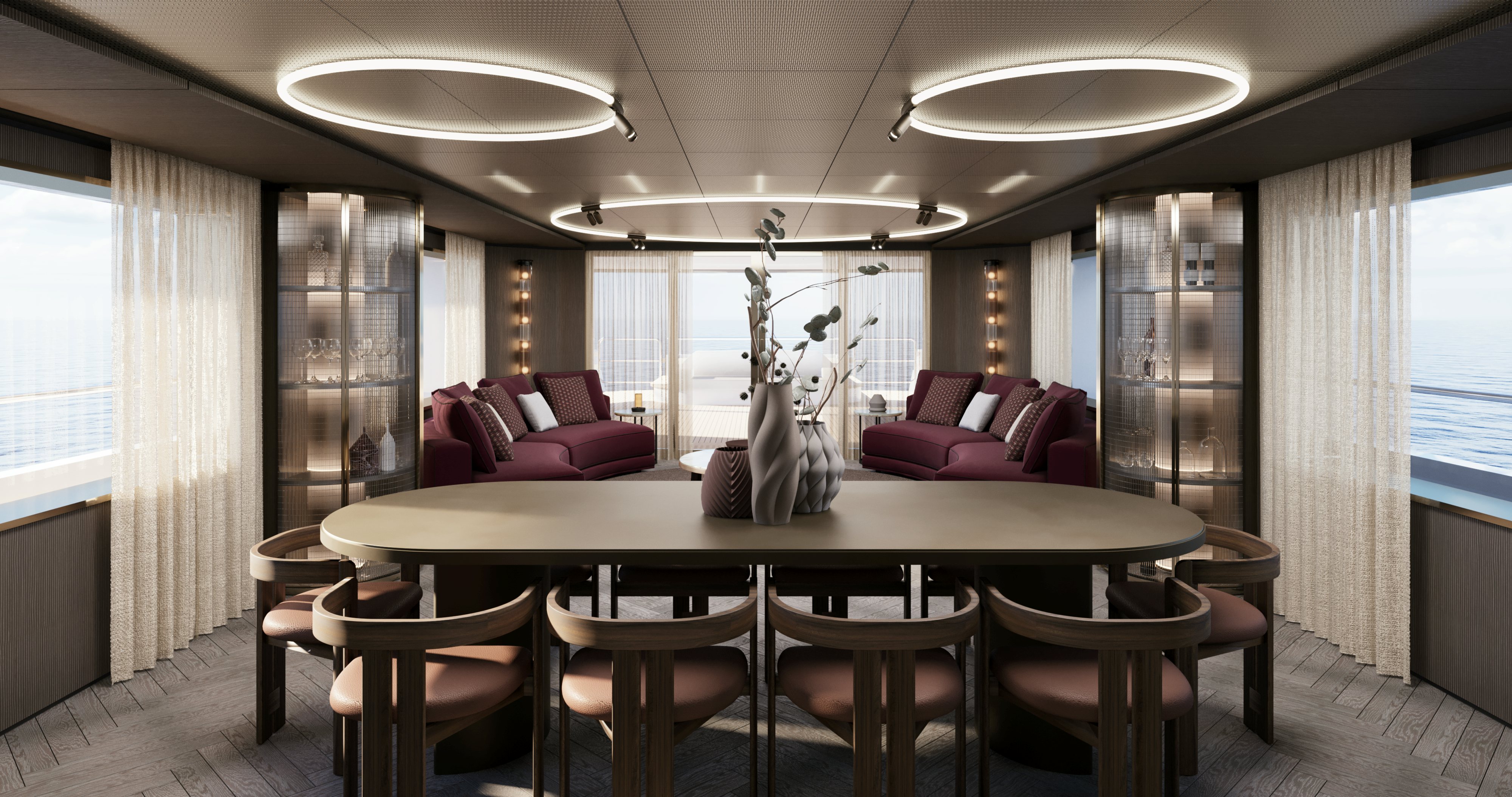 a living room with a table and chairs aboard OCEAN KING EXPLORER 34M Yacht for Sale