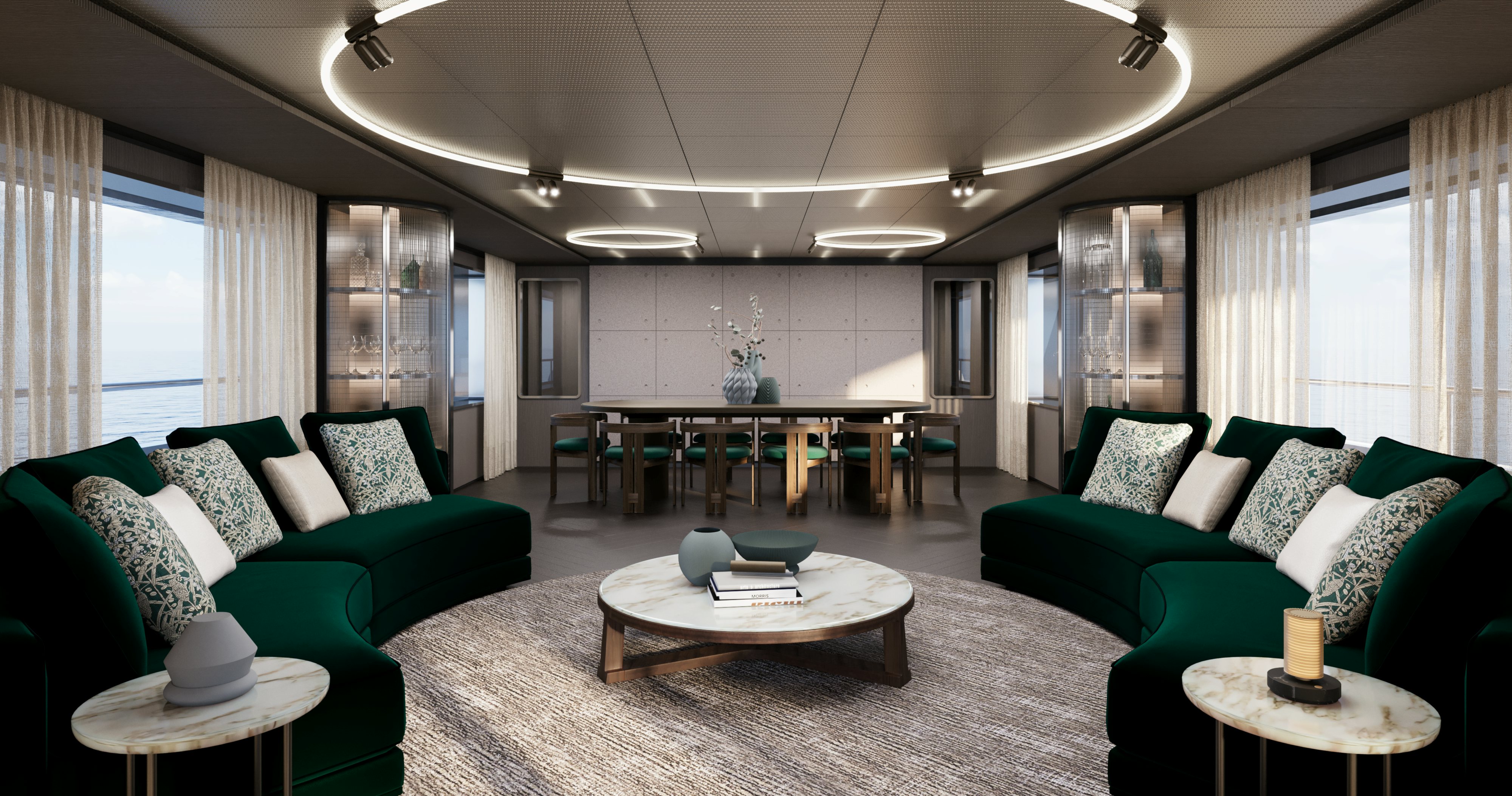 a living room with green couches aboard OCEAN KING EXPLORER 34M Yacht for Sale