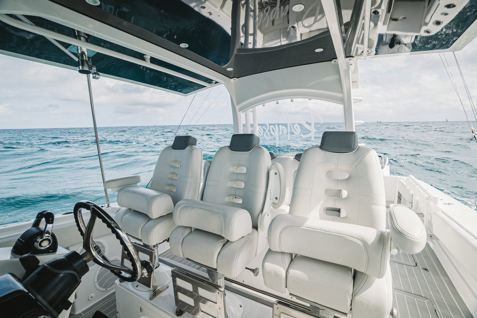 a boat with white seats aboard RELAPSE Yacht for Sale