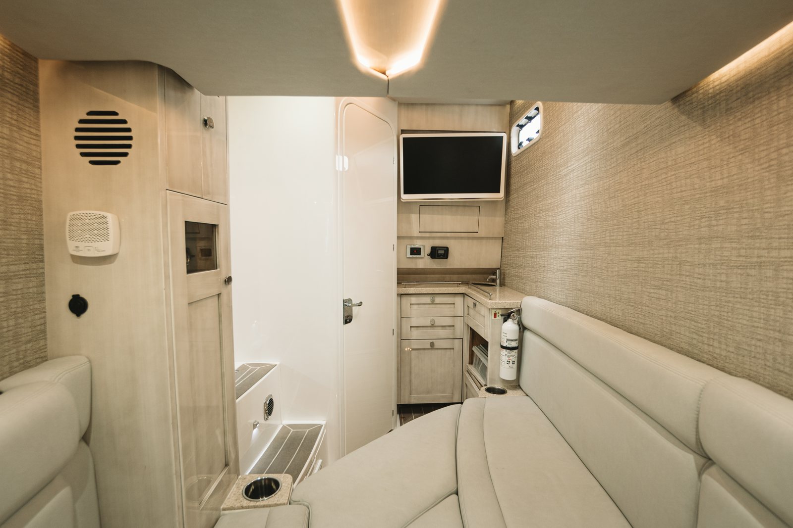 a room with a bed and a television aboard RELAPSE Yacht for Sale