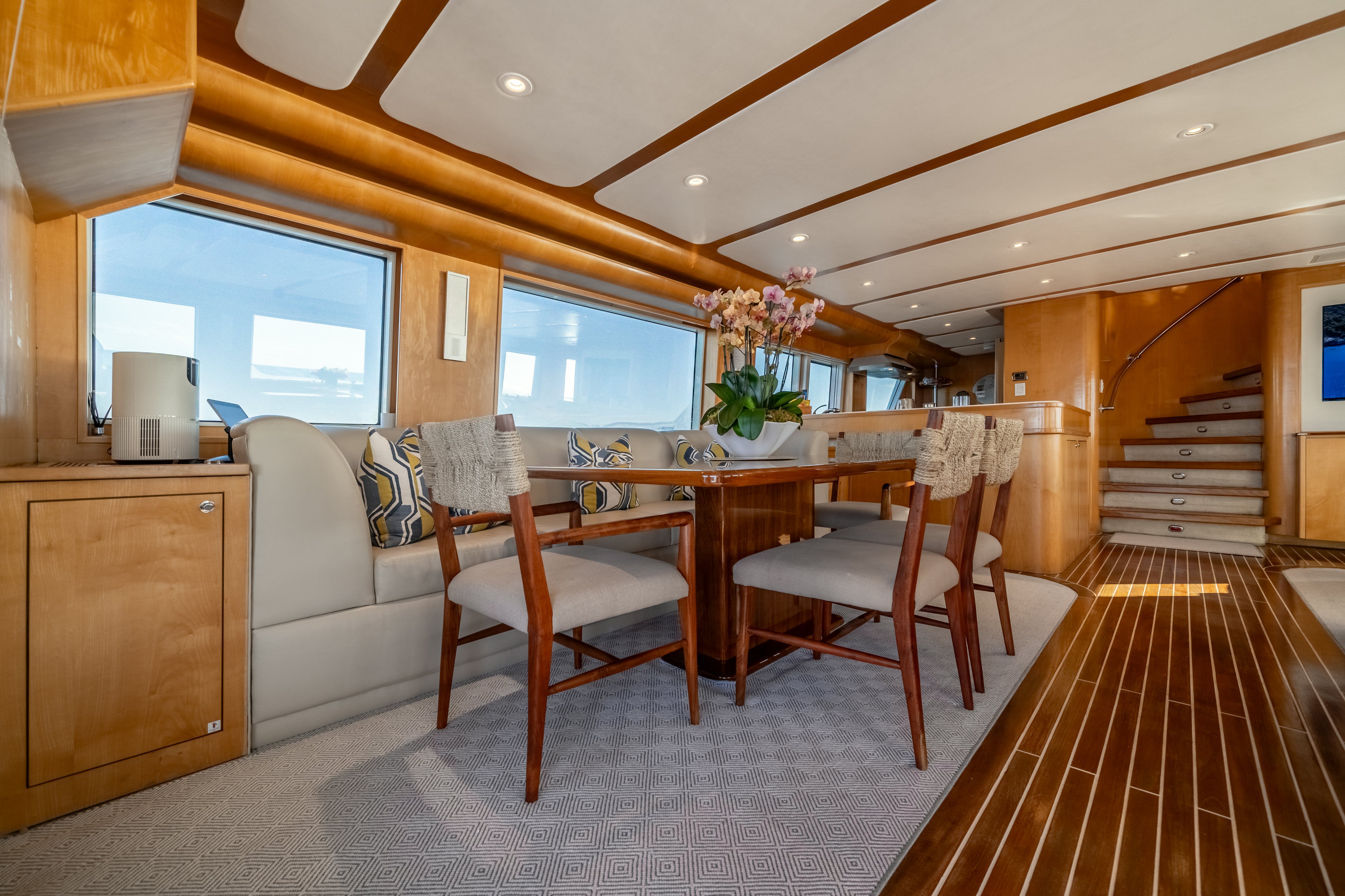 a large kitchen and dining area aboard DESTINATION Yacht for Sale