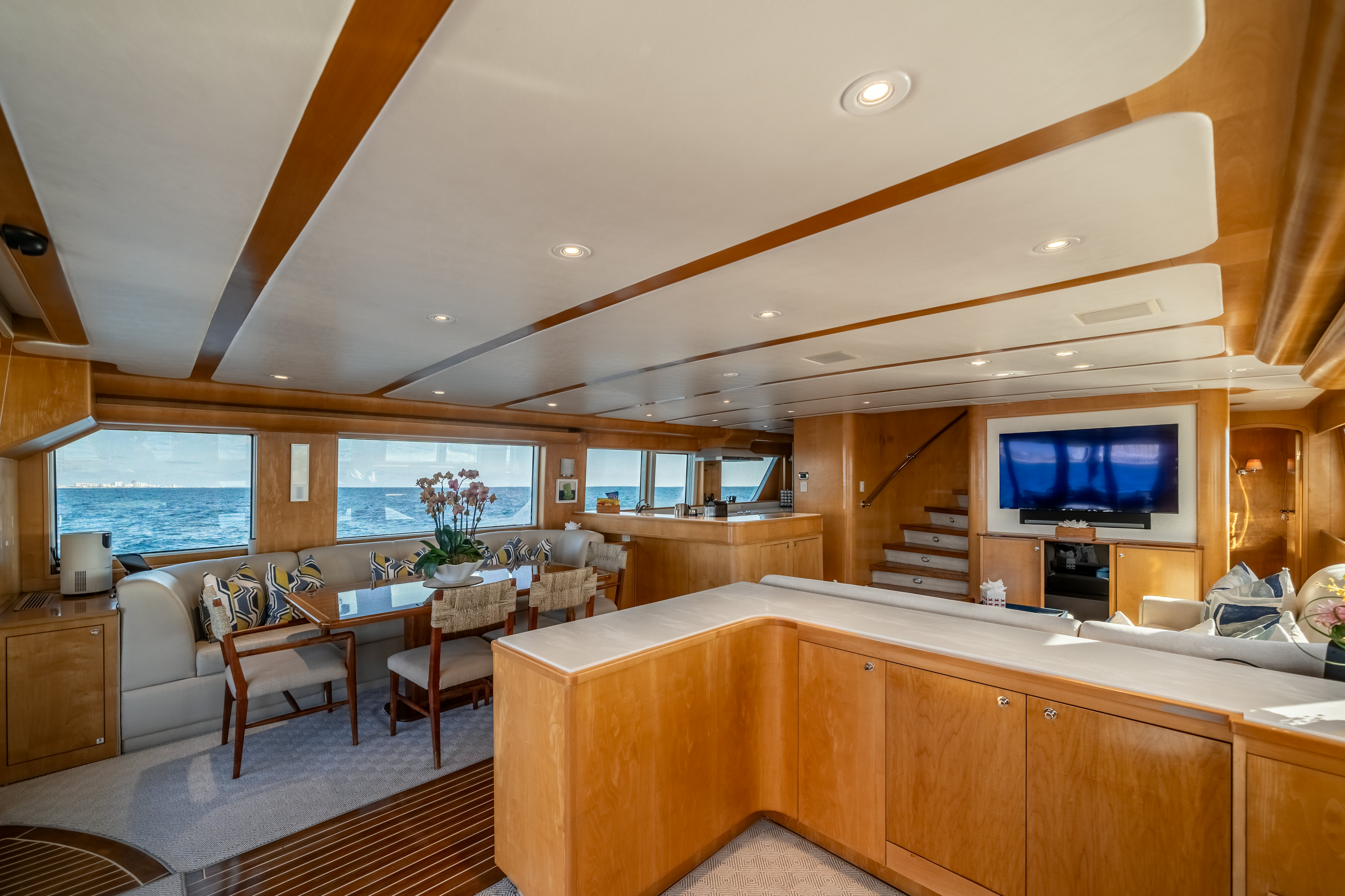 a large kitchen with a large tv aboard DESTINATION Yacht for Sale