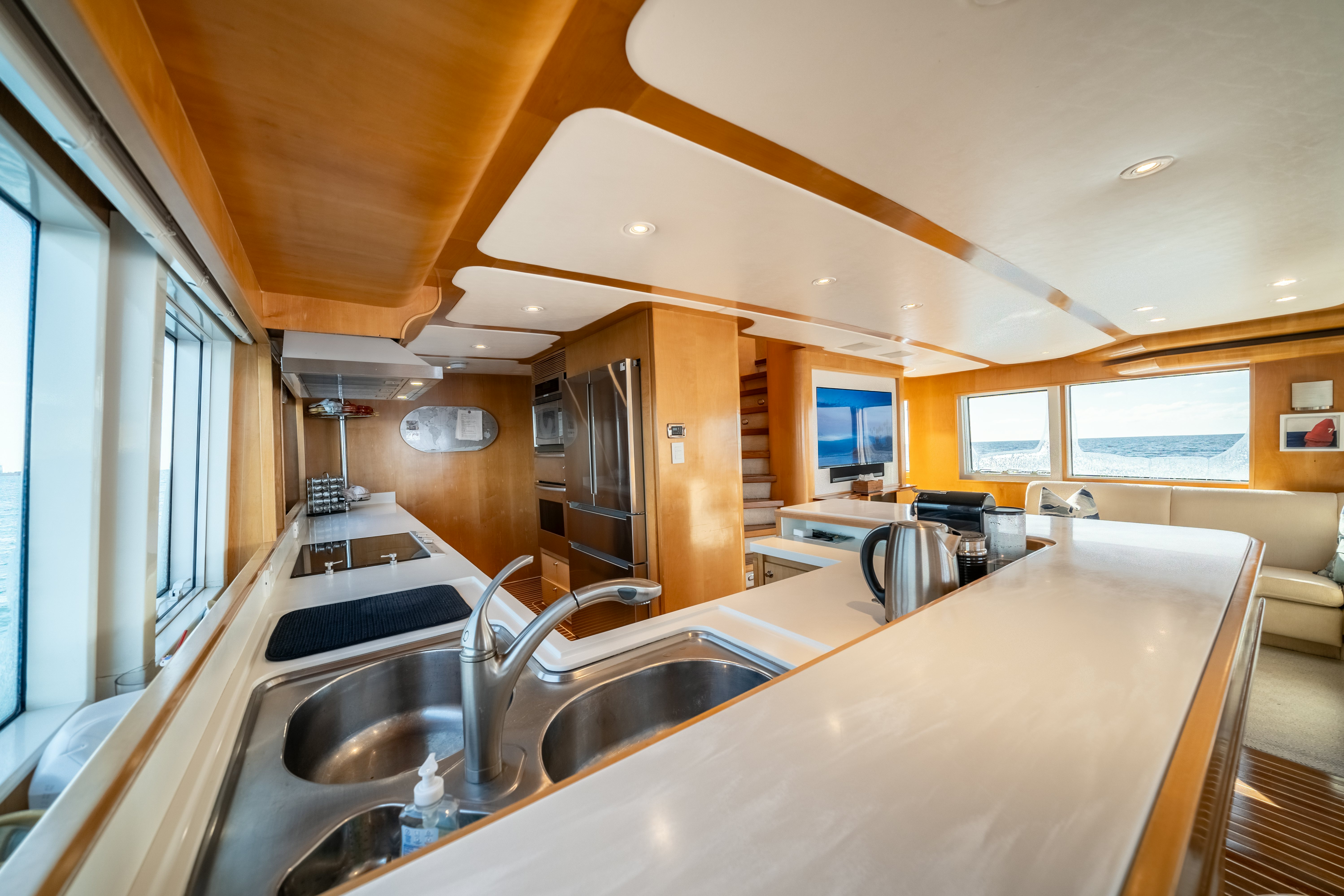 a kitchen with a large island aboard DESTINATION Yacht for Sale