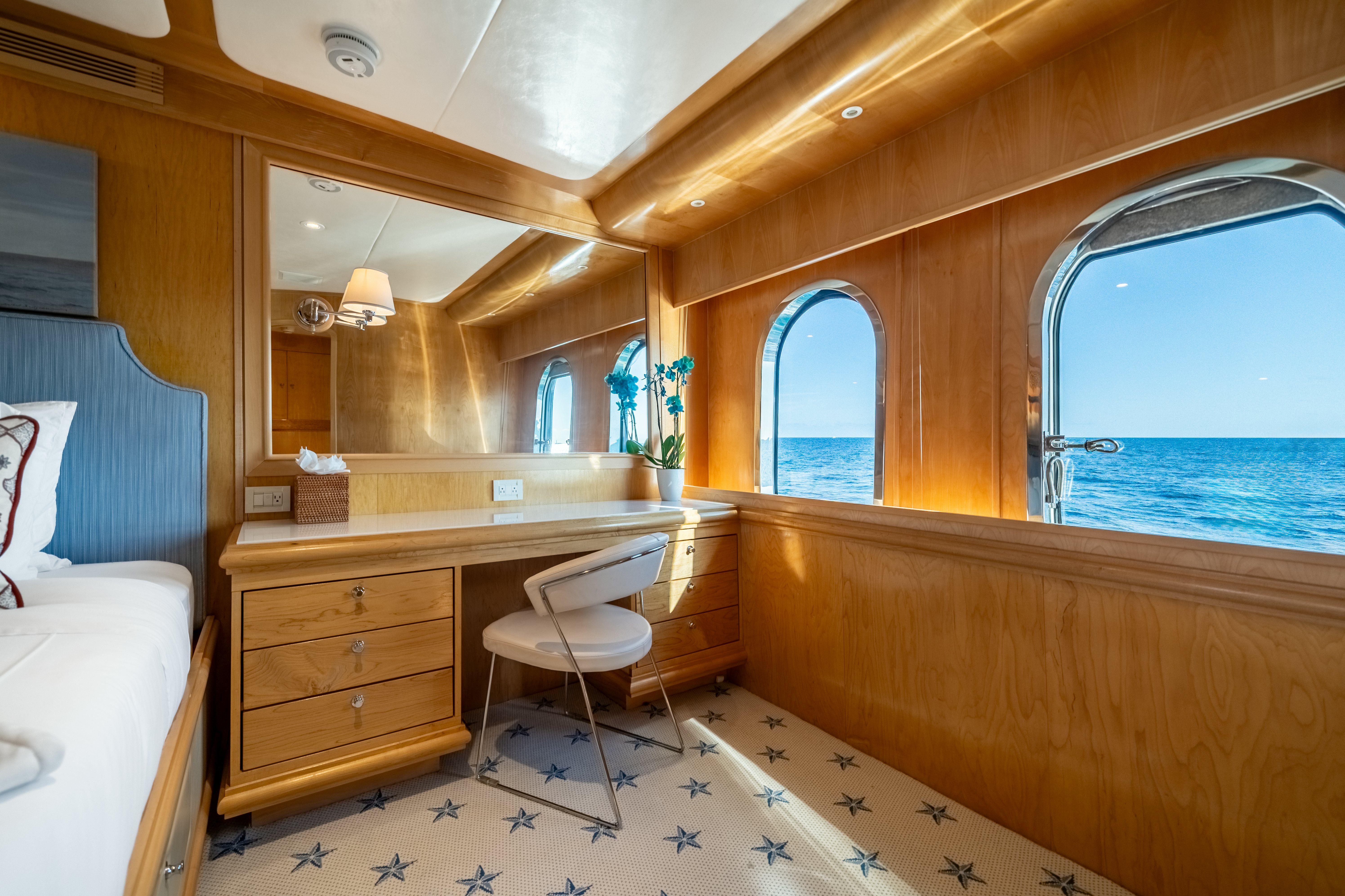 a room with a desk and a chair aboard DESTINATION Yacht for Sale