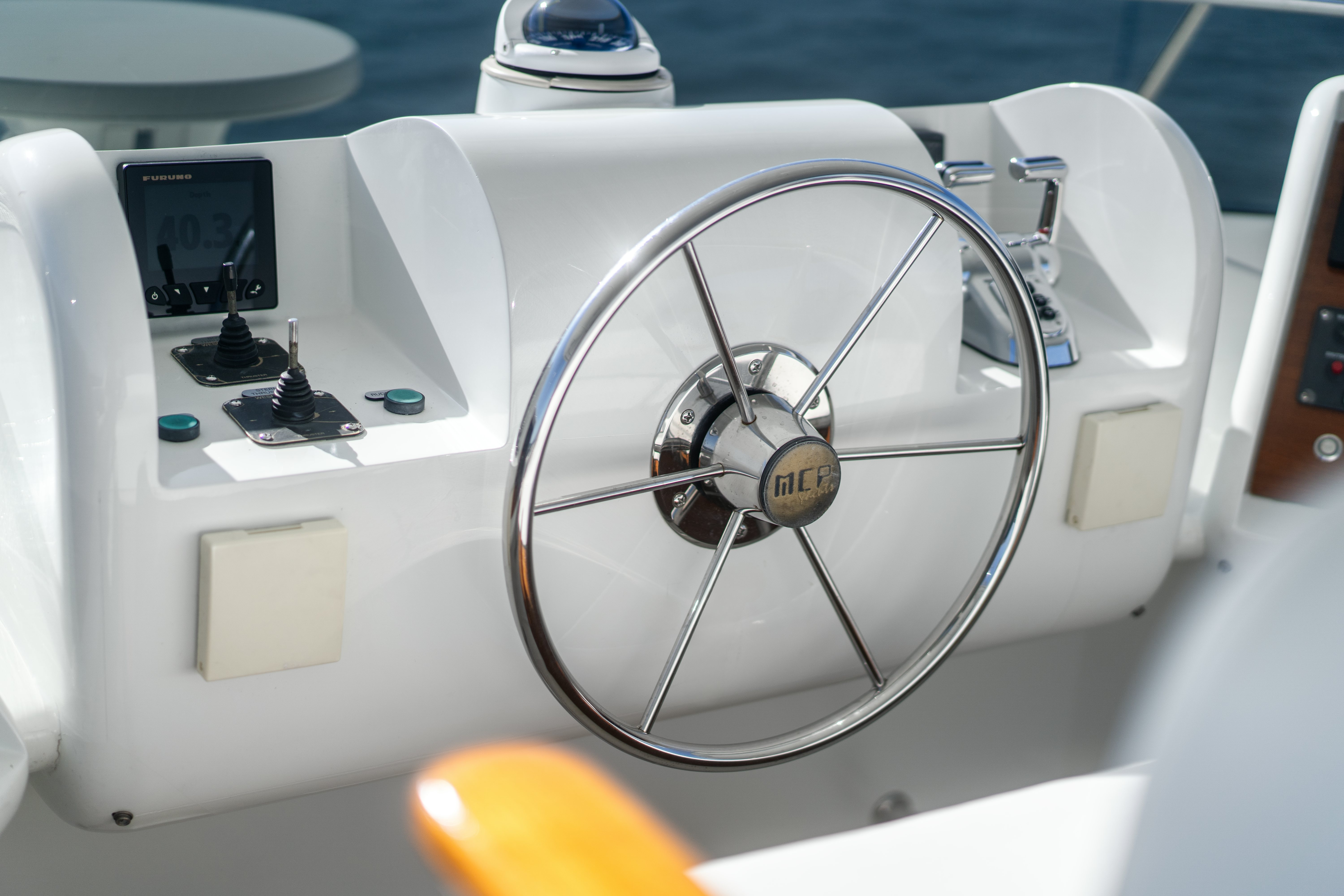 a white machine with a round fan aboard DESTINATION Yacht for Sale