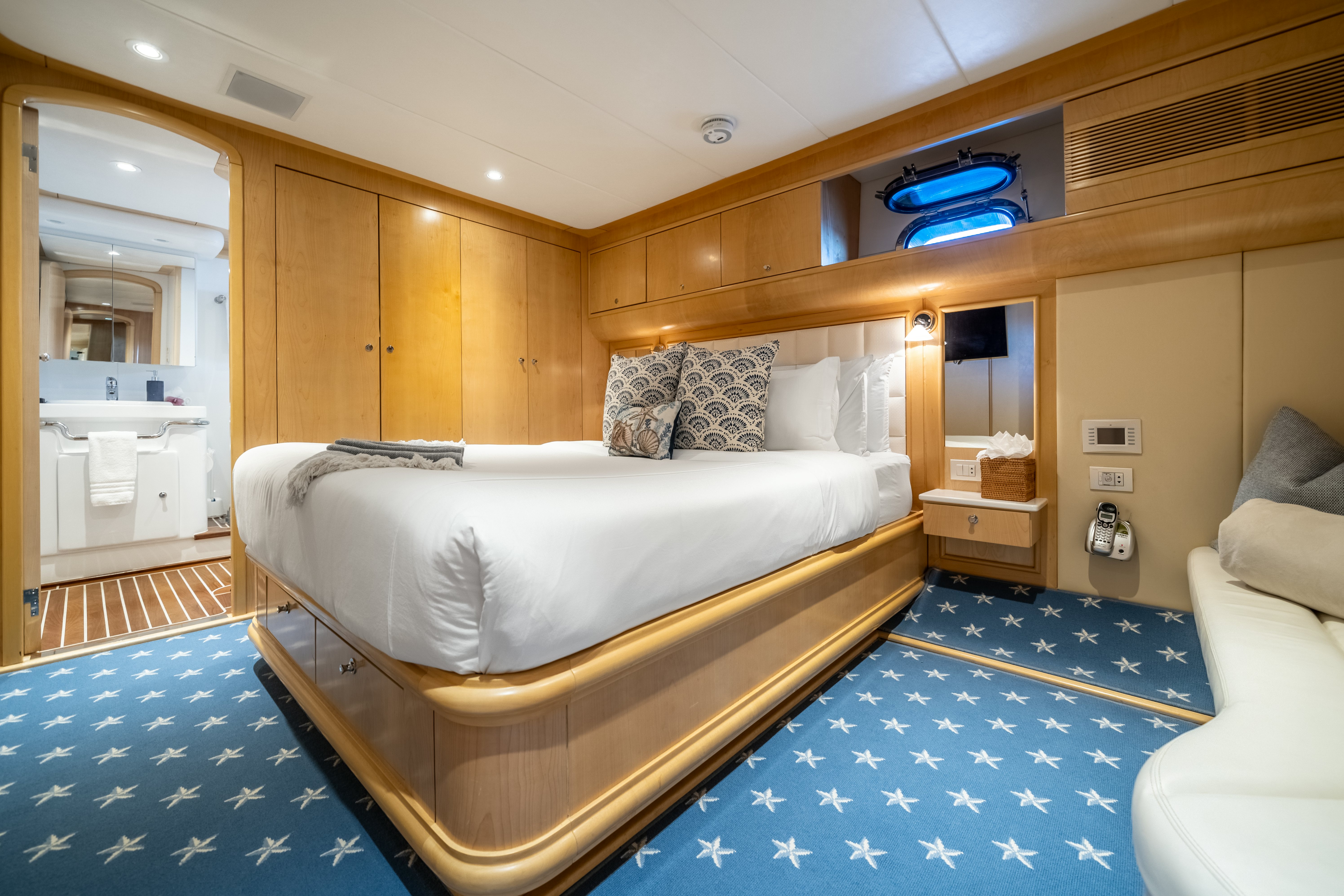a bed in a room aboard DESTINATION Yacht for Sale