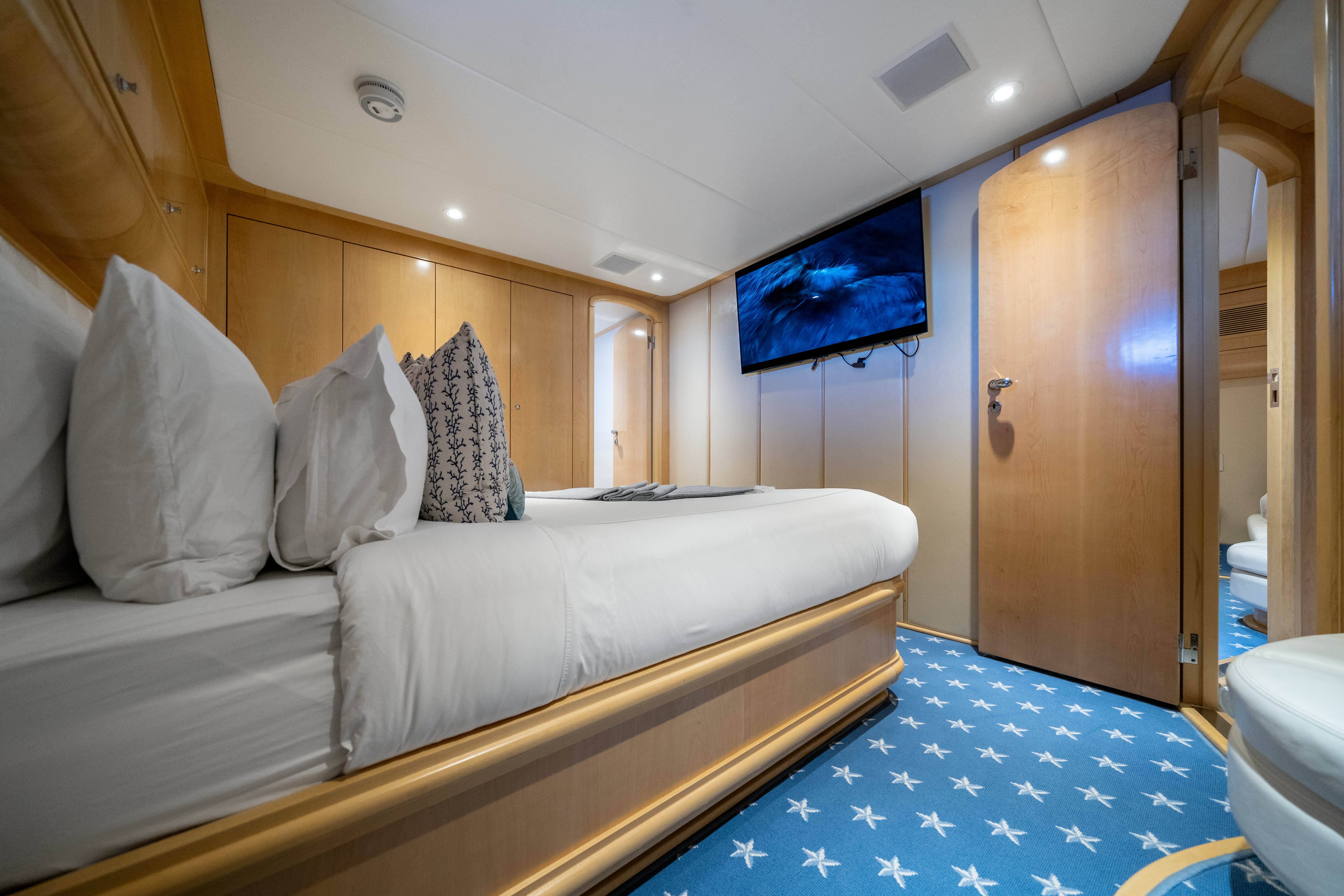 a bed in a room aboard DESTINATION Yacht for Sale