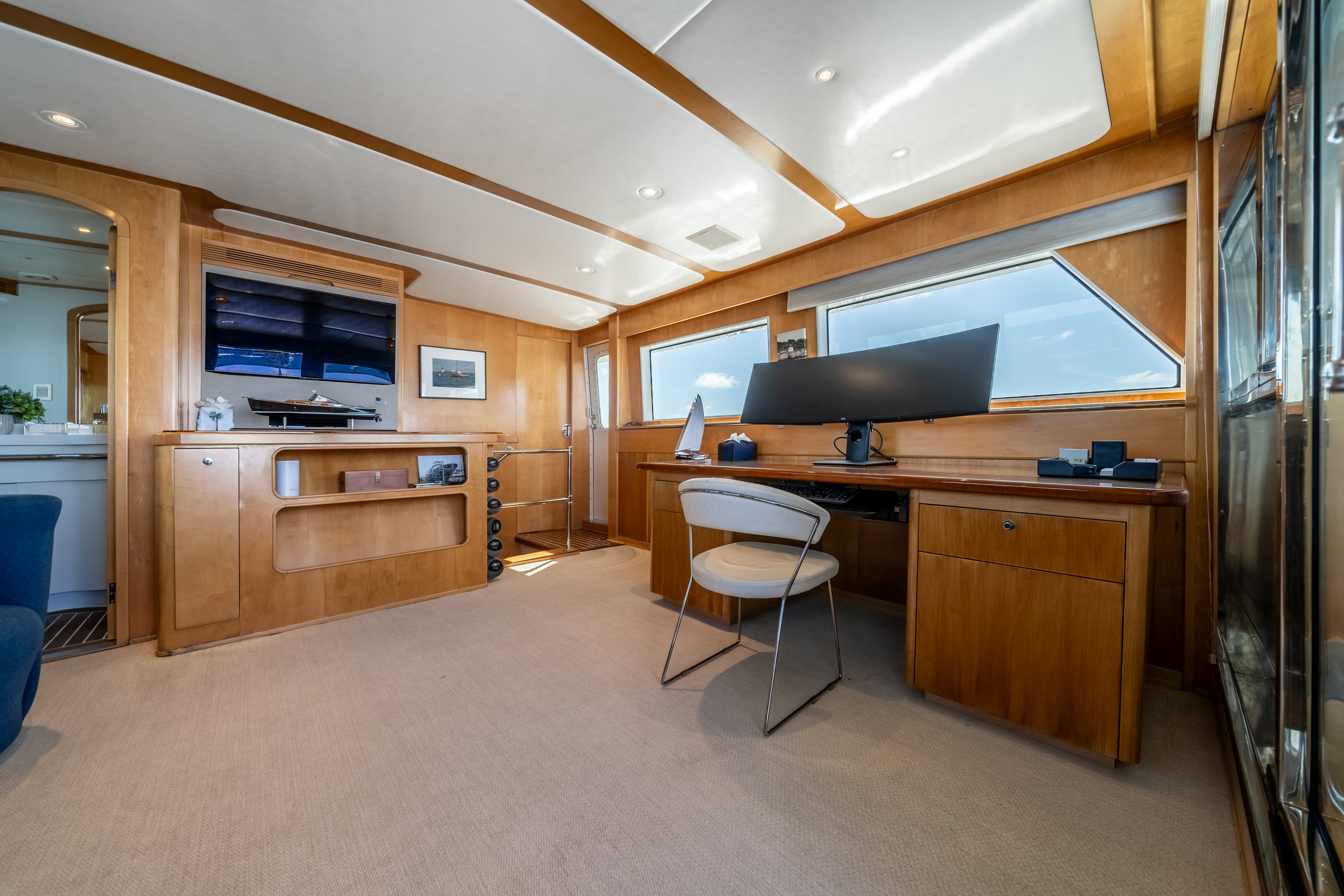 a large open office space aboard DESTINATION Yacht for Sale