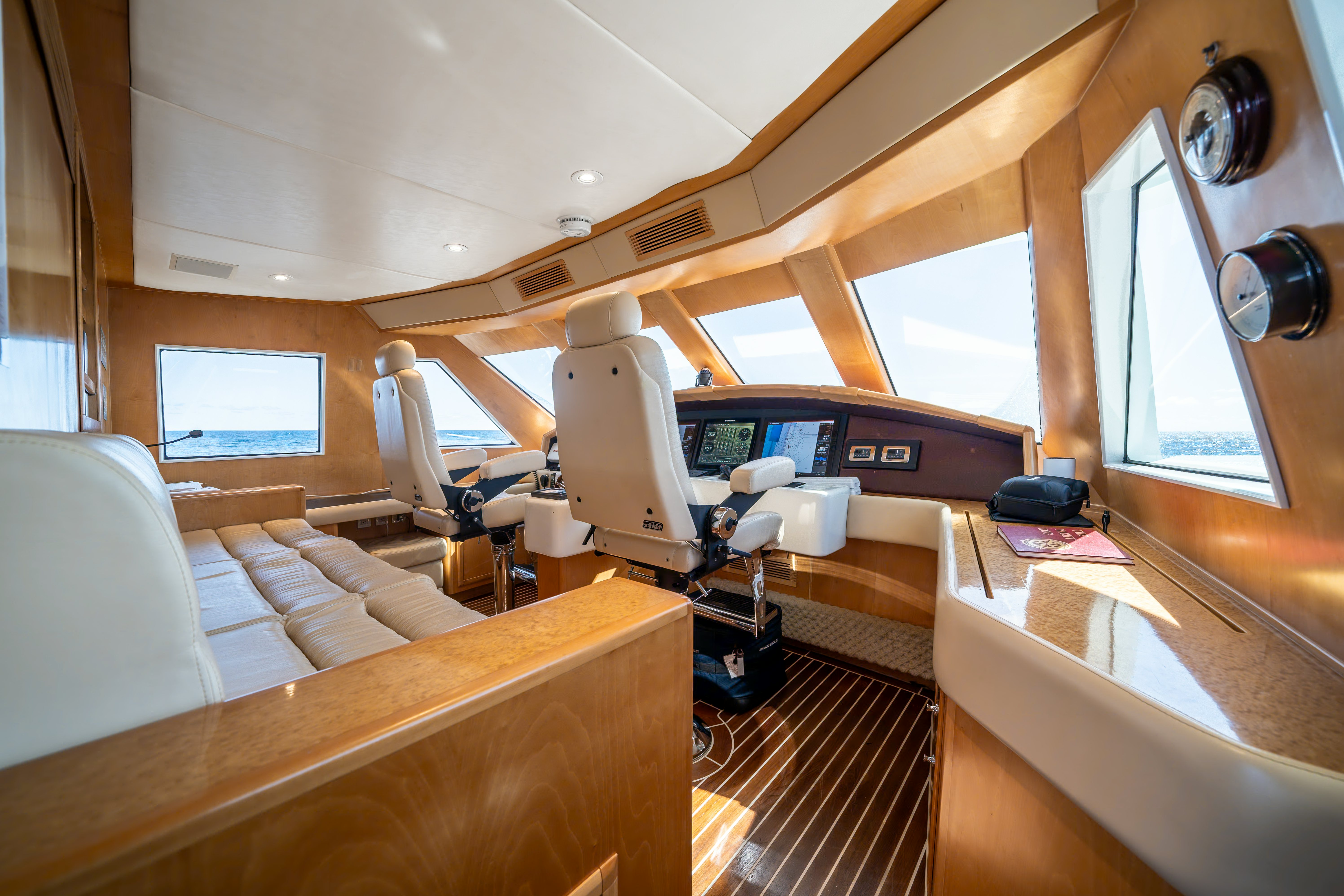 a room with a bed and a desk aboard DESTINATION Yacht for Sale