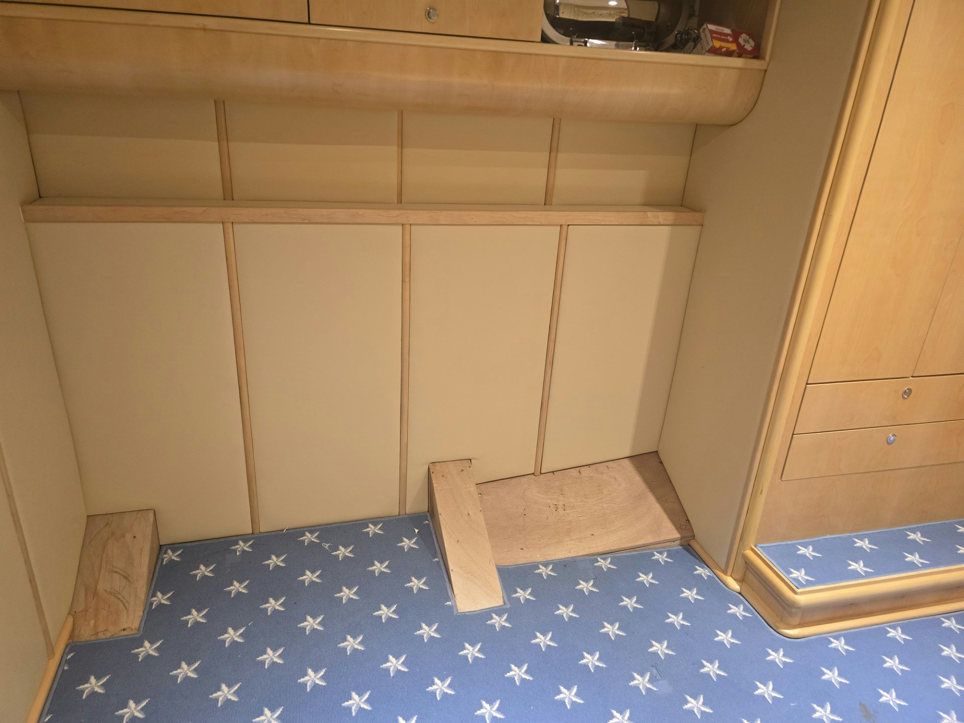 a wooden box on a bed aboard DESTINATION Yacht for Sale