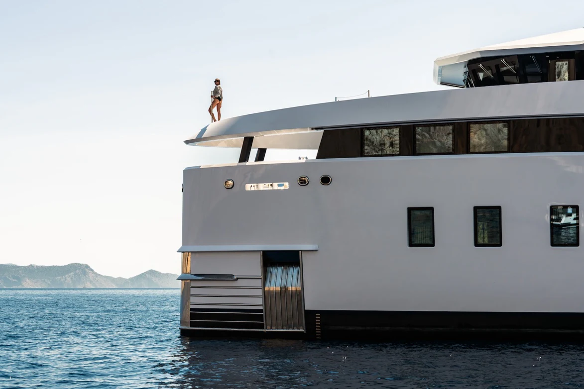 a person jumping off a boat aboard AFTER YOU Yacht for Charter