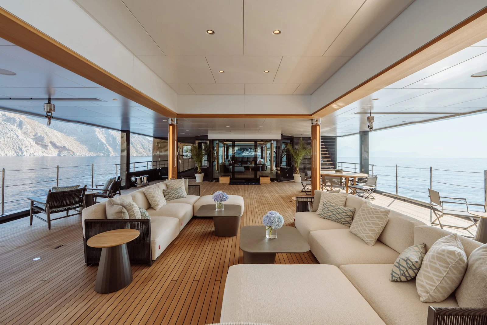 a living room with a large window aboard AFTER YOU Yacht for Charter