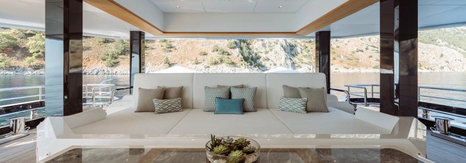 a large bed with pillows aboard AFTER YOU Yacht for Charter
