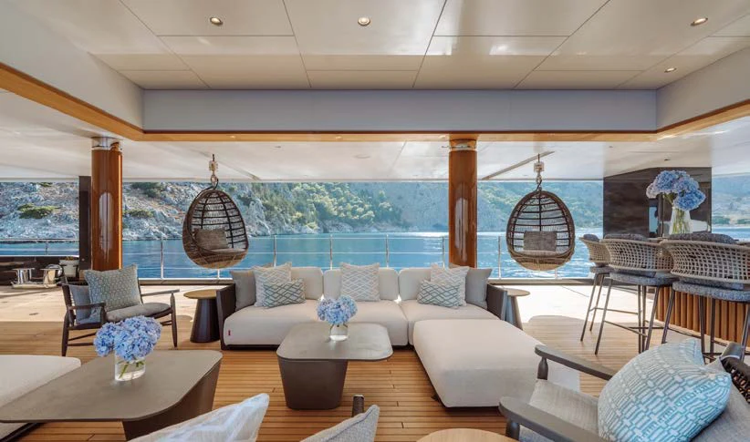 a living room with a large window aboard AFTER YOU Yacht for Charter