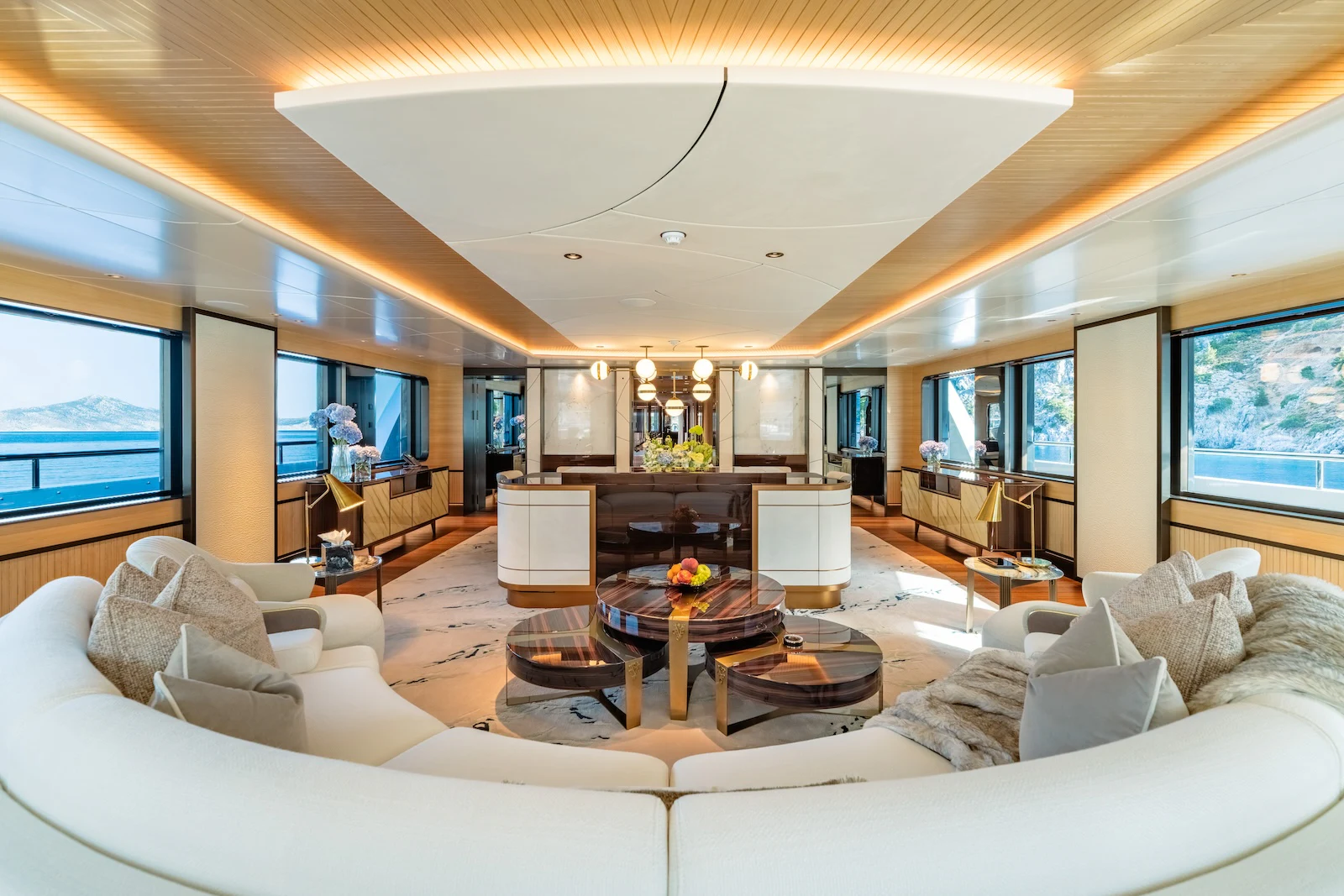a living room with a large screen aboard AFTER YOU Yacht for Charter
