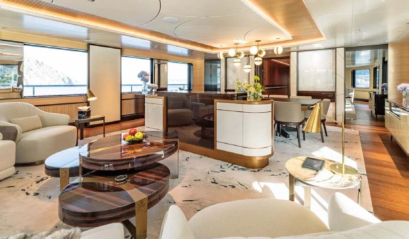 a living room with a table and chairs aboard AFTER YOU Yacht for Charter