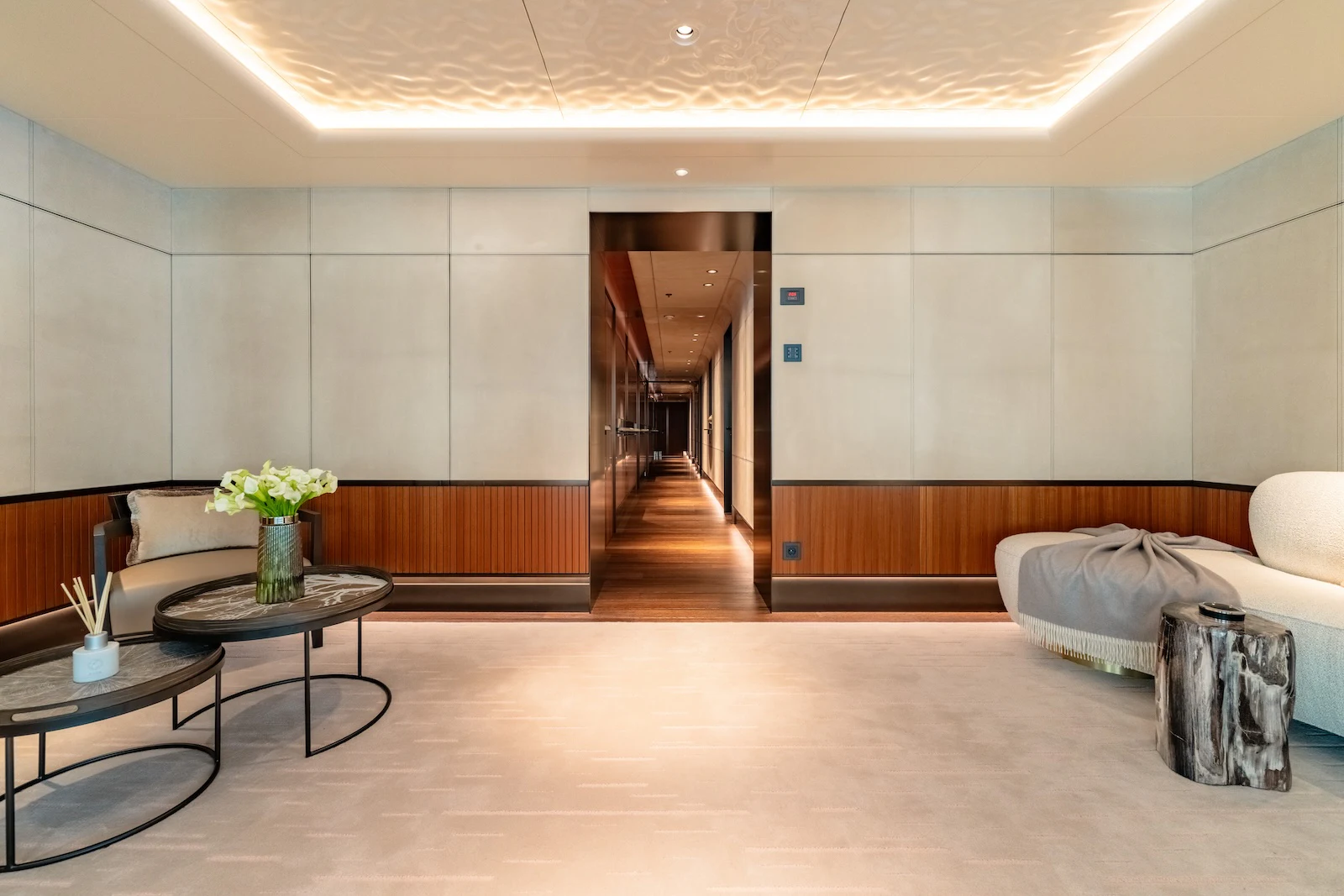 a room with a couch and a table and a chair aboard AFTER YOU Yacht for Charter