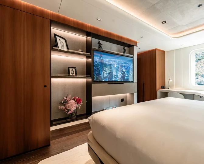 a bedroom with a large bed aboard AFTER YOU Yacht for Charter