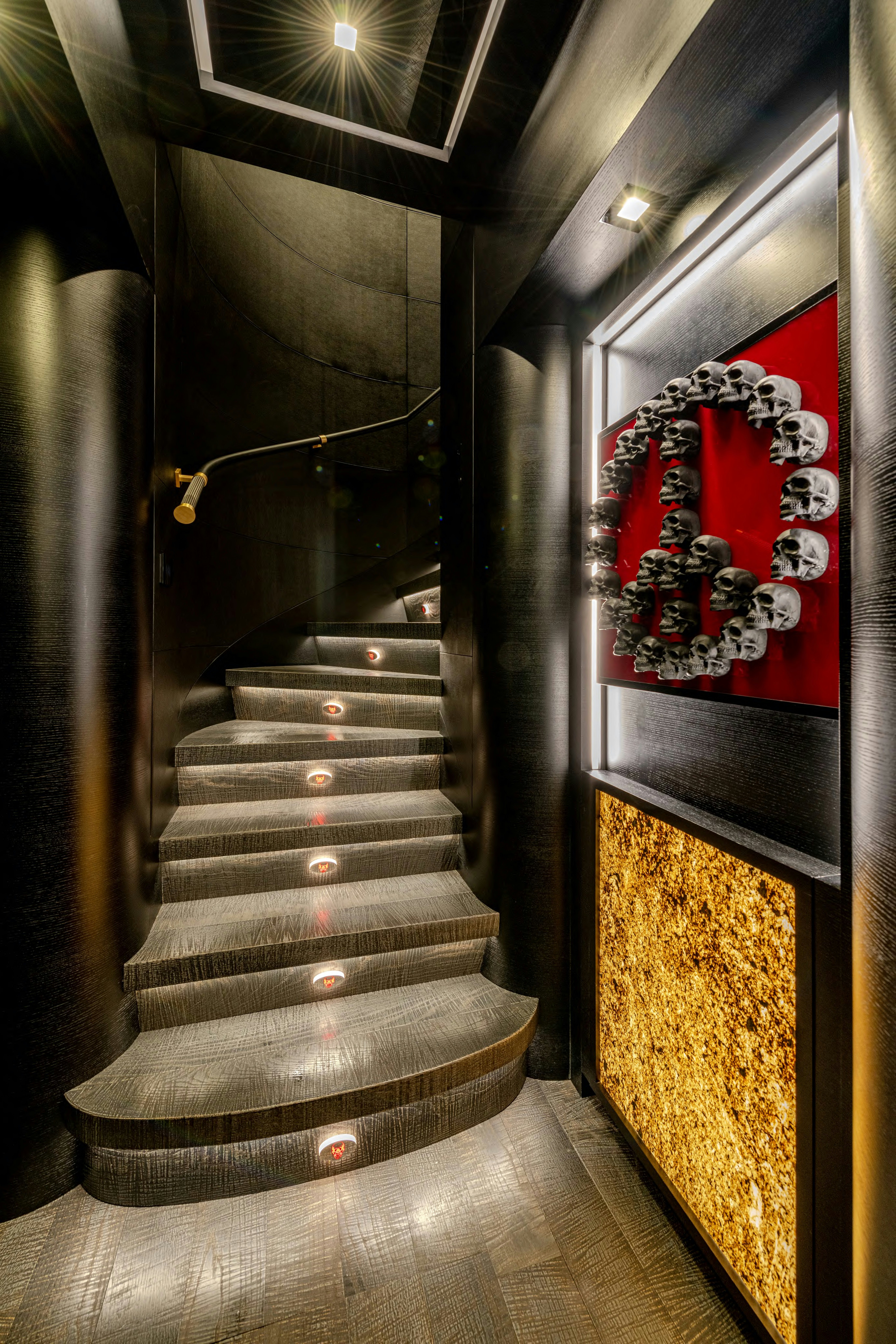 a staircase with a red sign aboard BLACK LEGEND Yacht for Sale