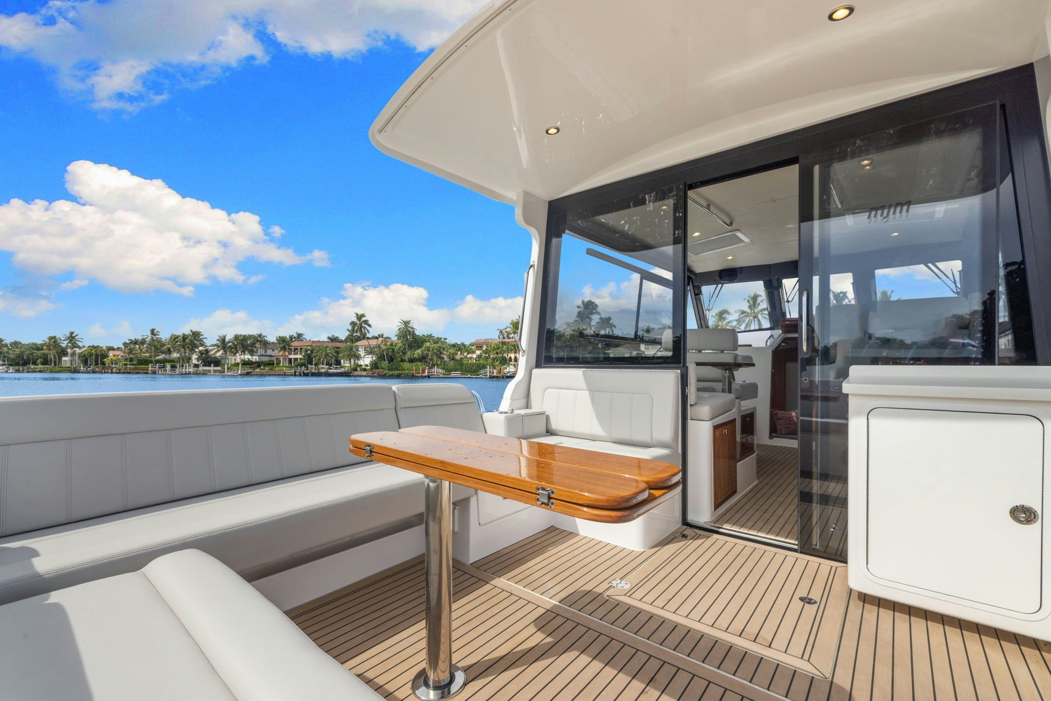 a room with a table and a bench aboard ANNABELLE Yacht for Sale