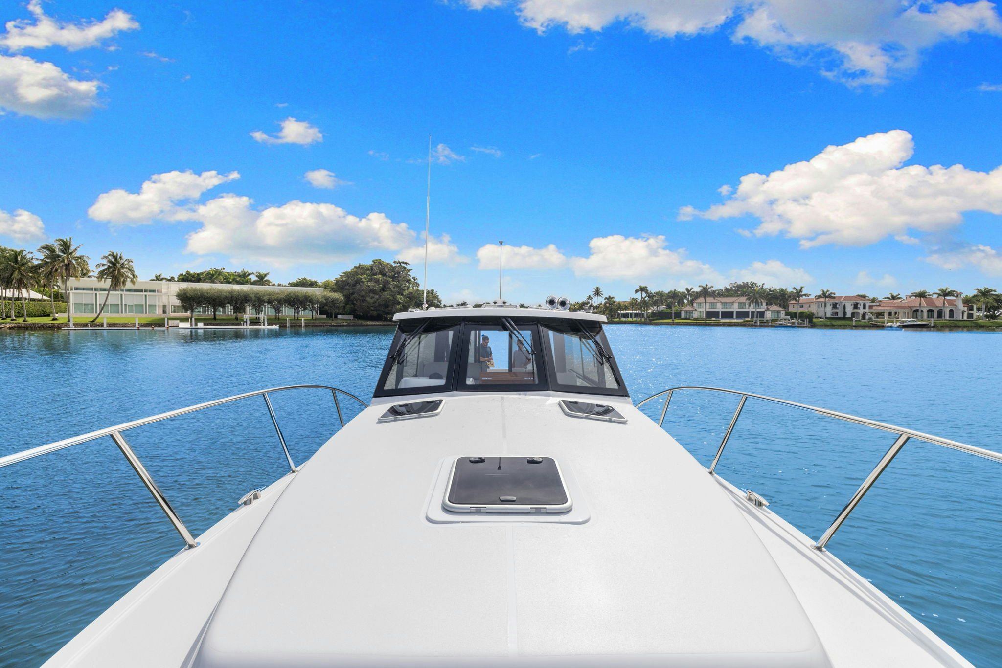 a white boat on a body of water aboard ANNABELLE Yacht for Sale