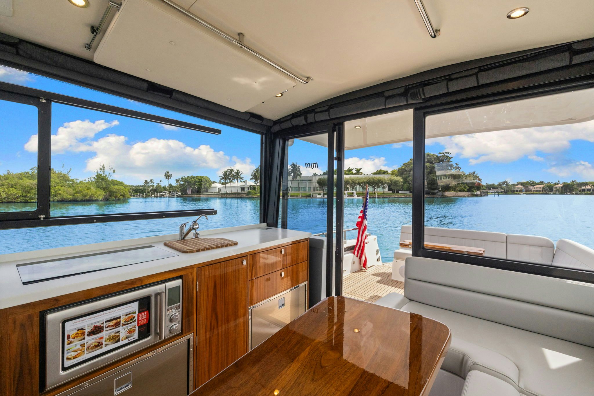 a room with a view of the ocean and a large window aboard ANNABELLE Yacht for Sale
