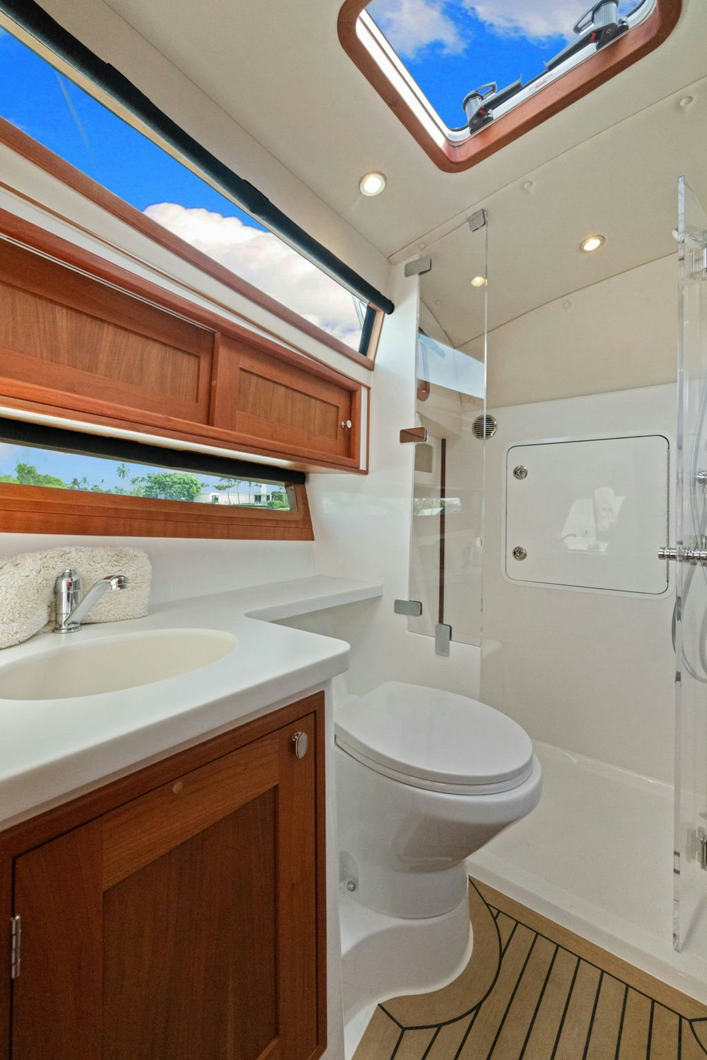 a bathroom with a toilet and sink aboard ANNABELLE Yacht for Sale