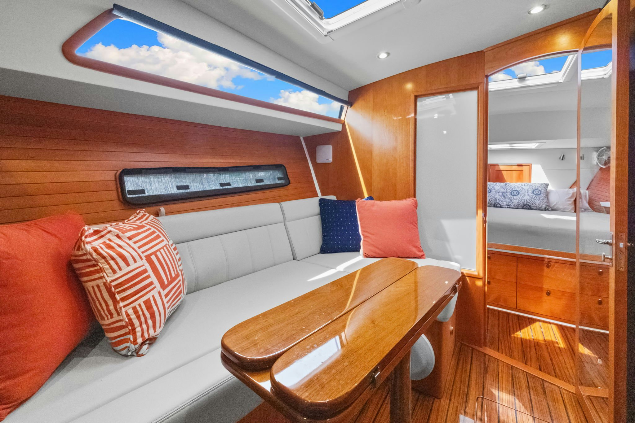 a room with a bed and a table aboard ANNABELLE Yacht for Sale