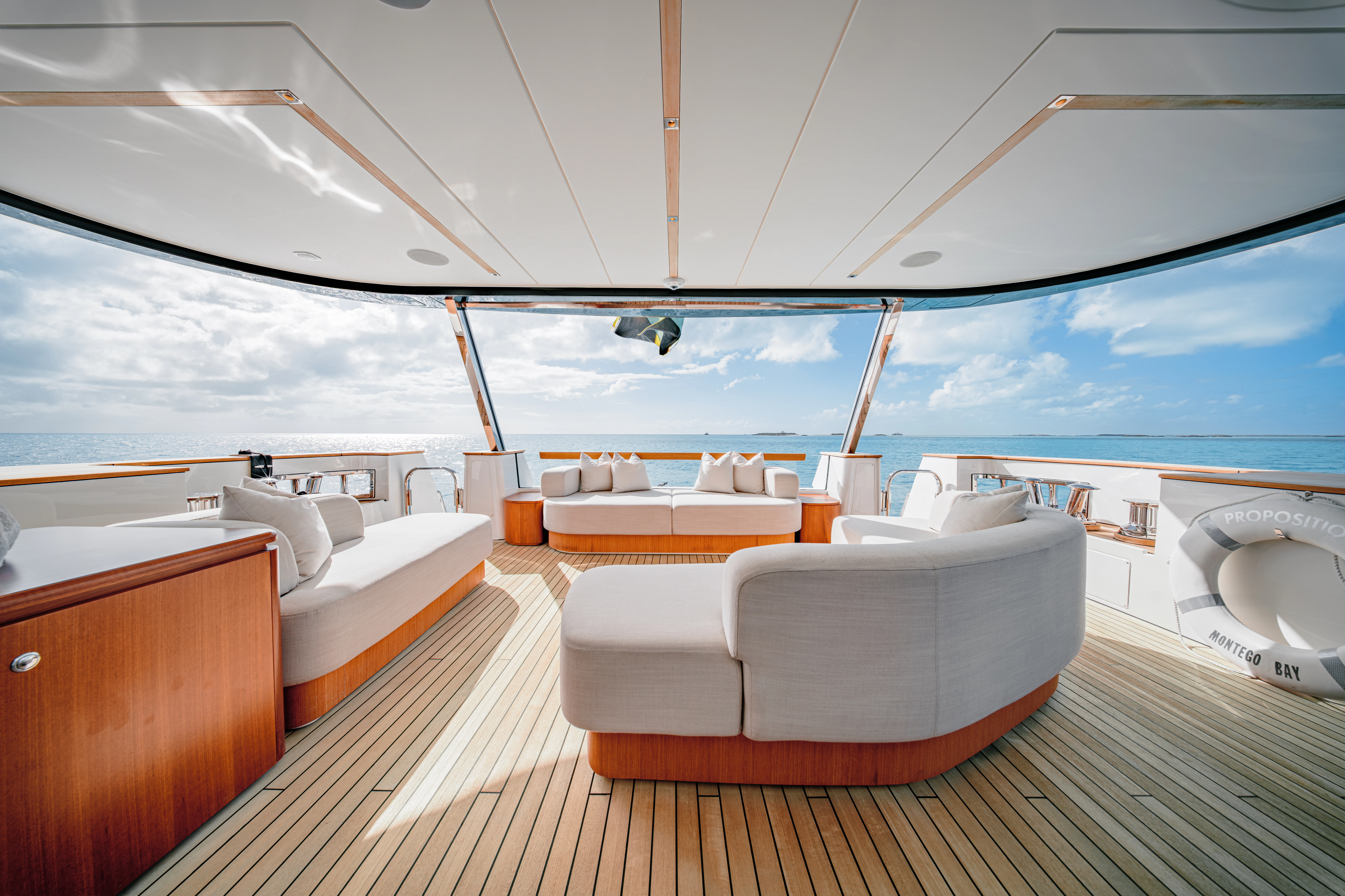 a room with a view of the ocean and the ocean aboard PROPOSITION Yacht for Charter