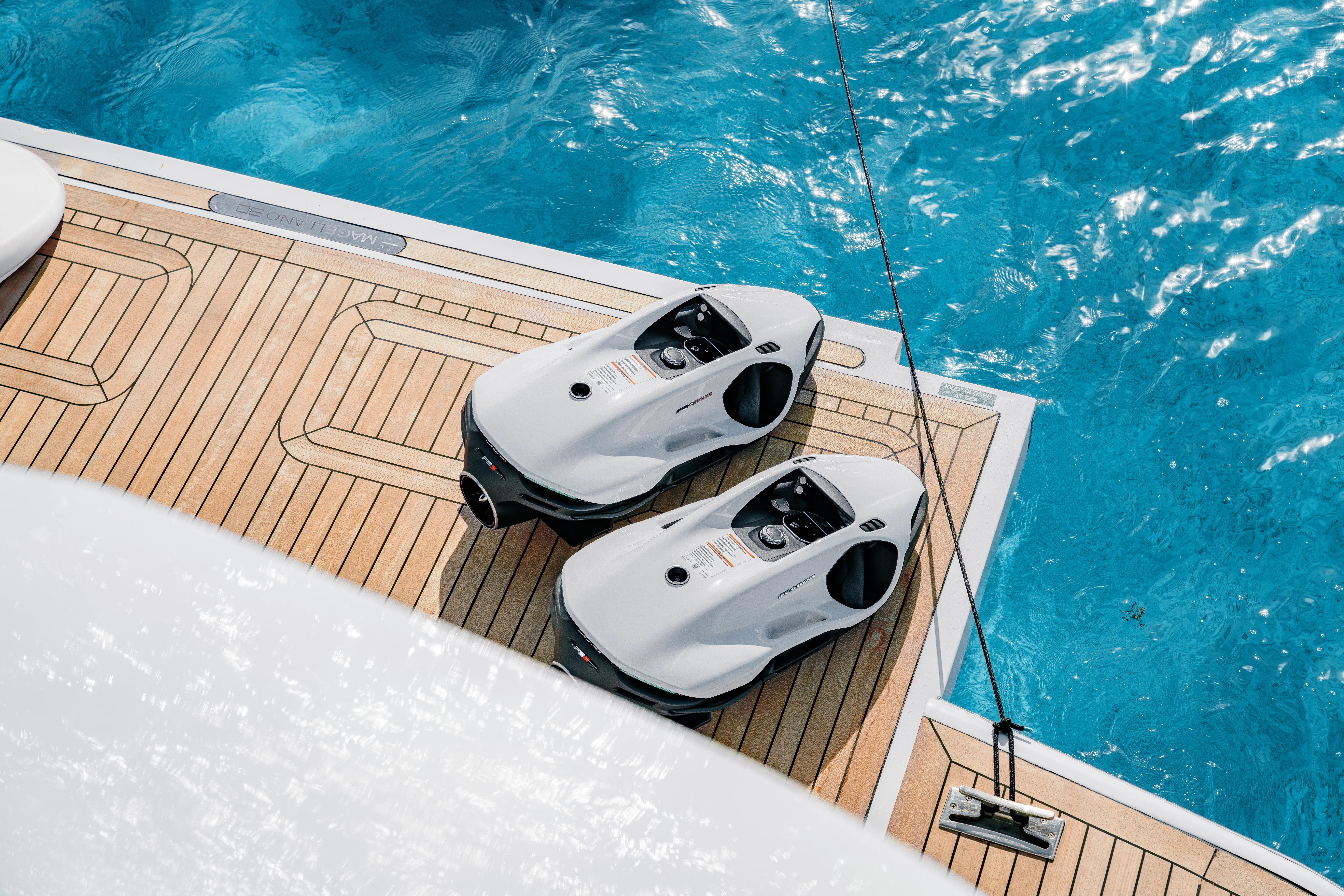 a white camera on a boat aboard PROPOSITION Yacht for Charter