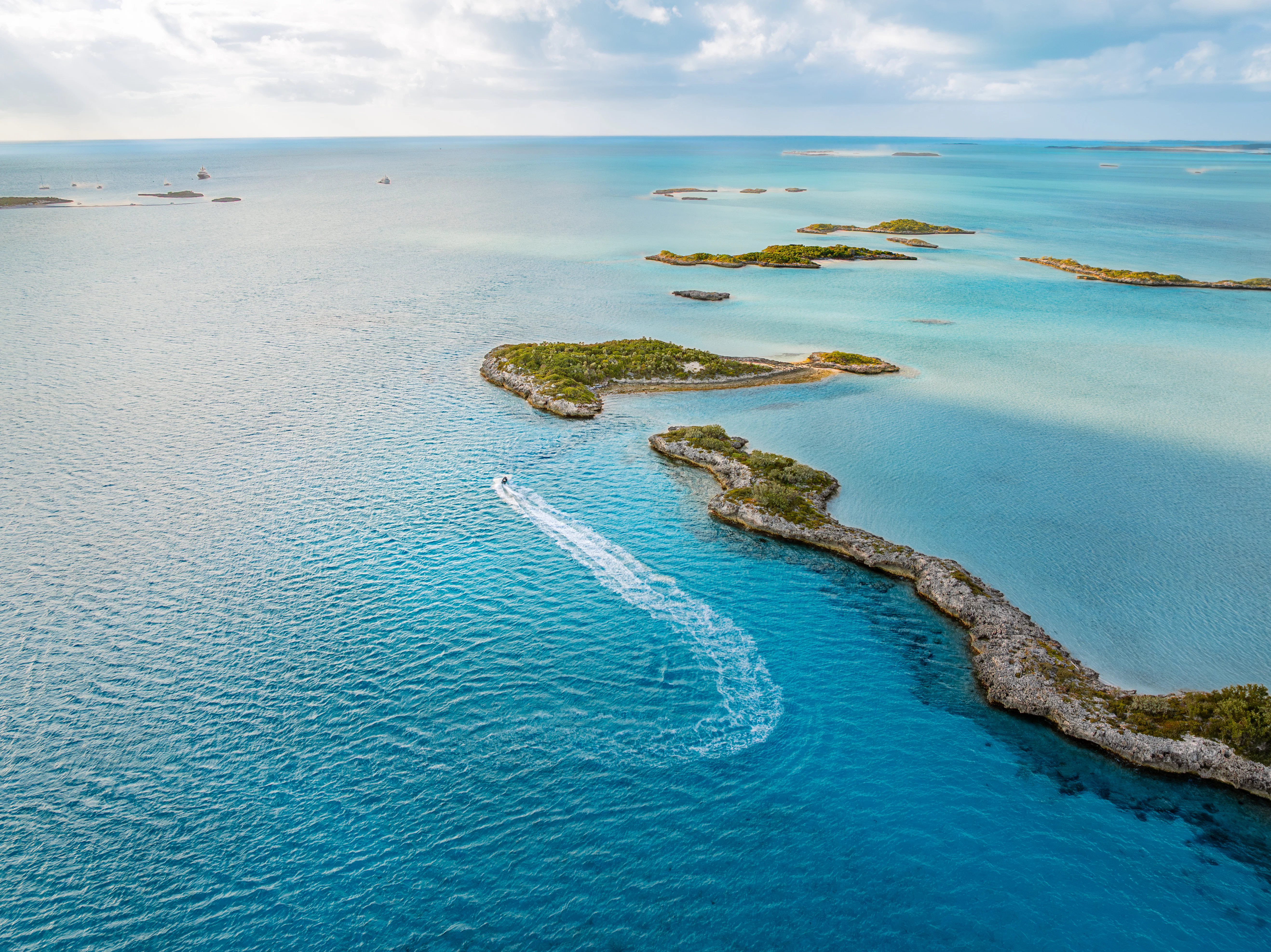 a body of water with islands aboard PROPOSITION Yacht for Charter