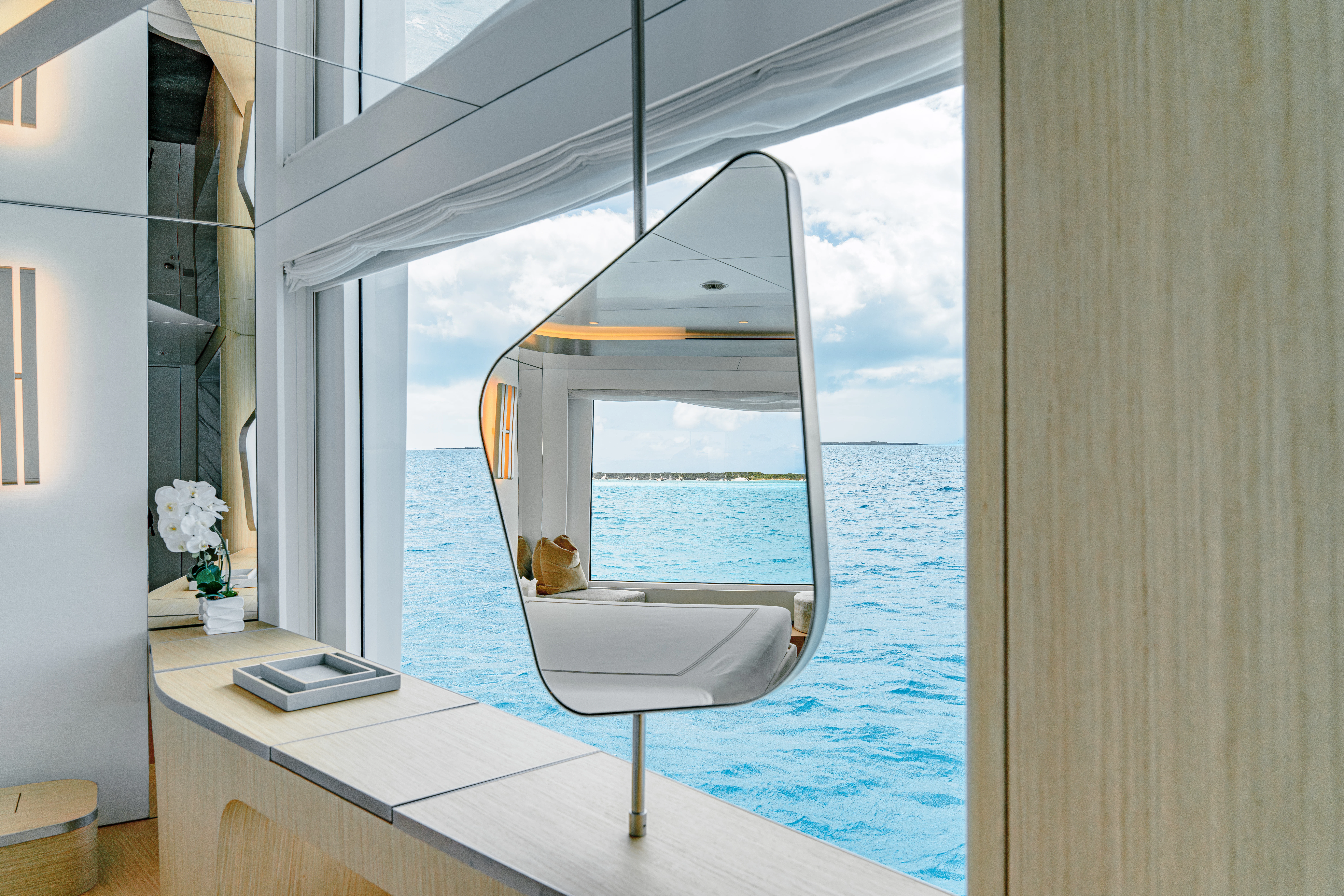 a large window overlooking the ocean aboard PROPOSITION Yacht for Charter