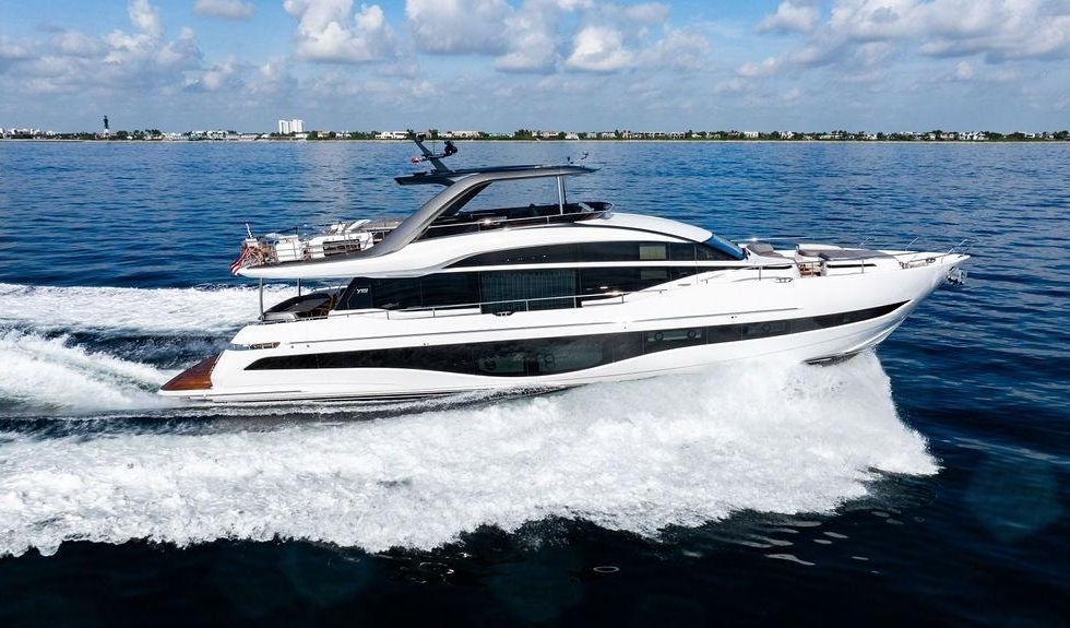 a white yacht on the water aboard GYPZY Yacht for Charter