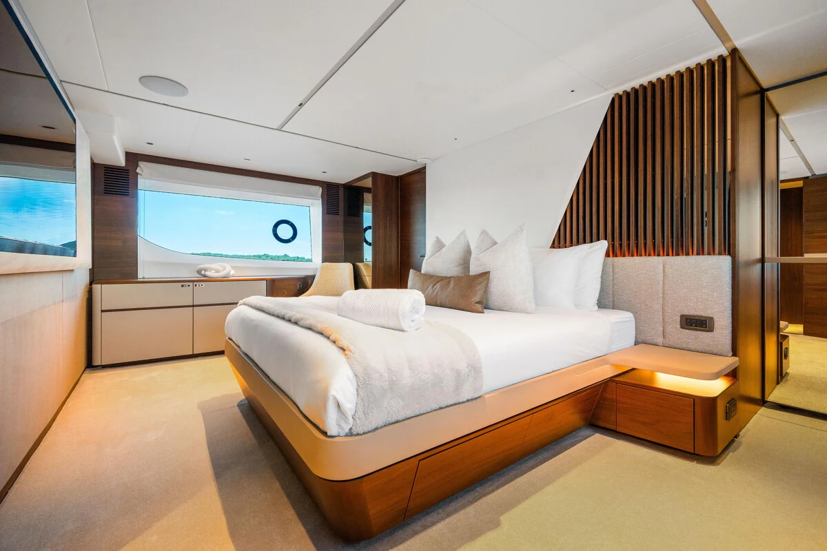 a bed in a room aboard GYPZY Yacht for Charter