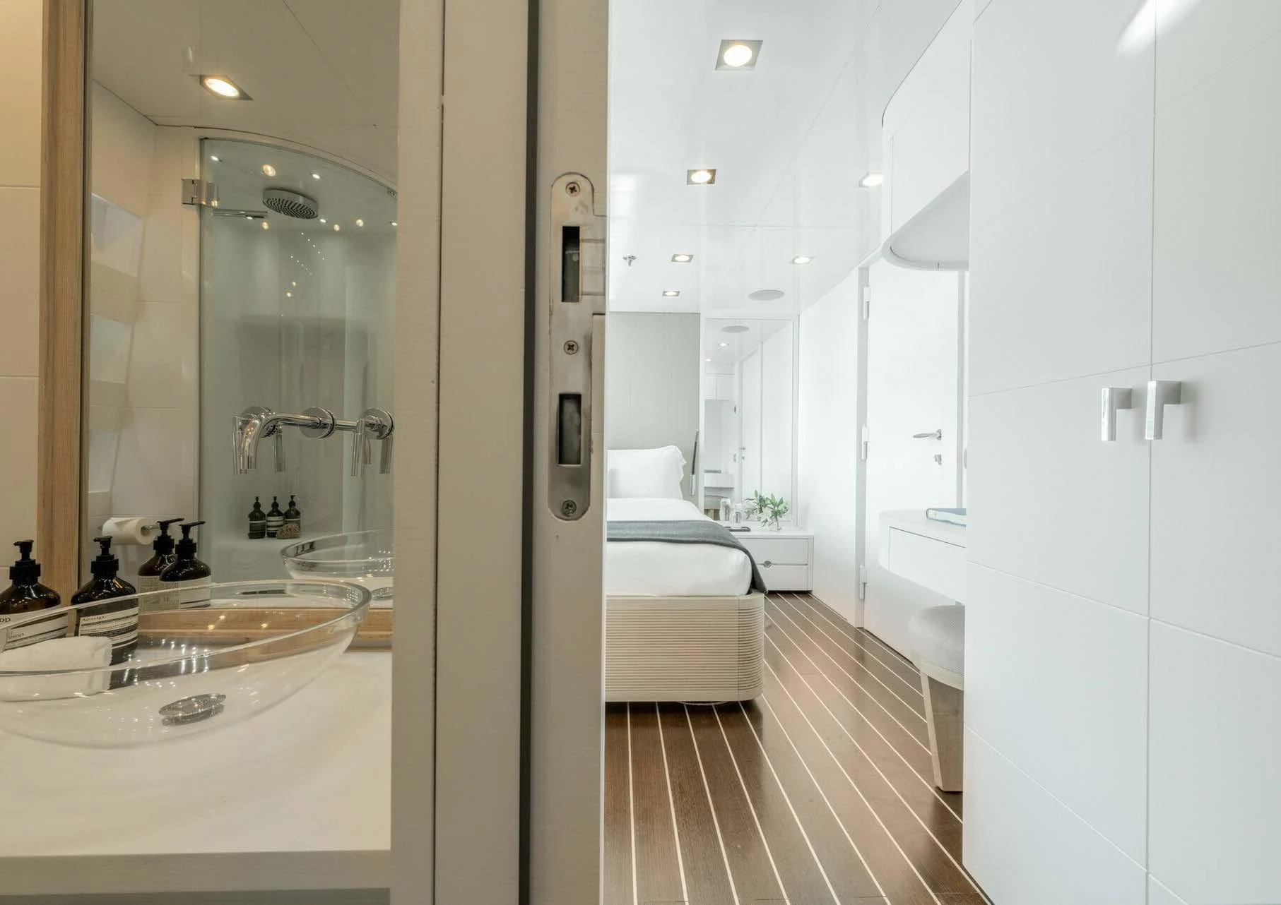 a bathroom with a large mirror aboard ZIA Yacht for Charter