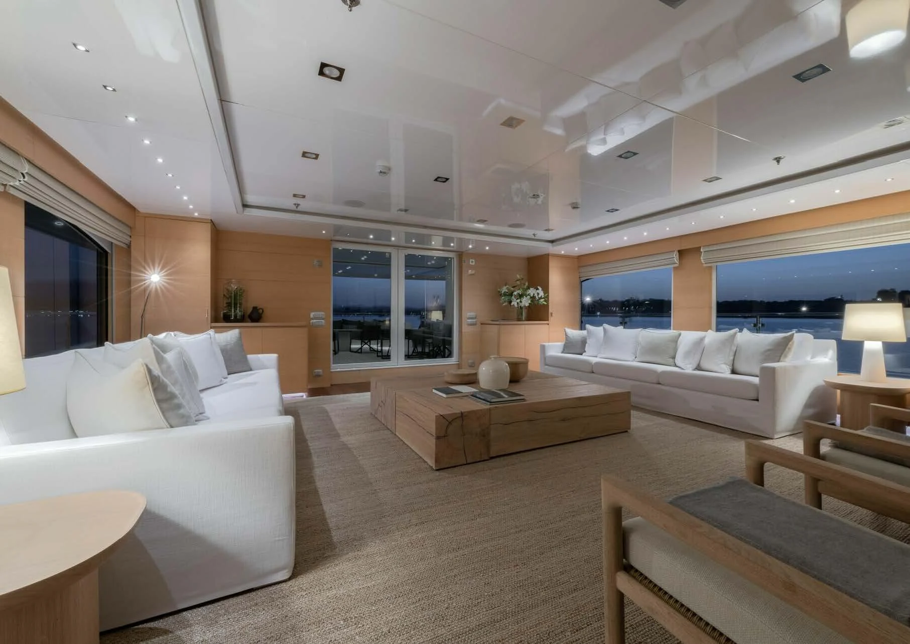 a living room with a couch and a table aboard ZIA Yacht for Charter