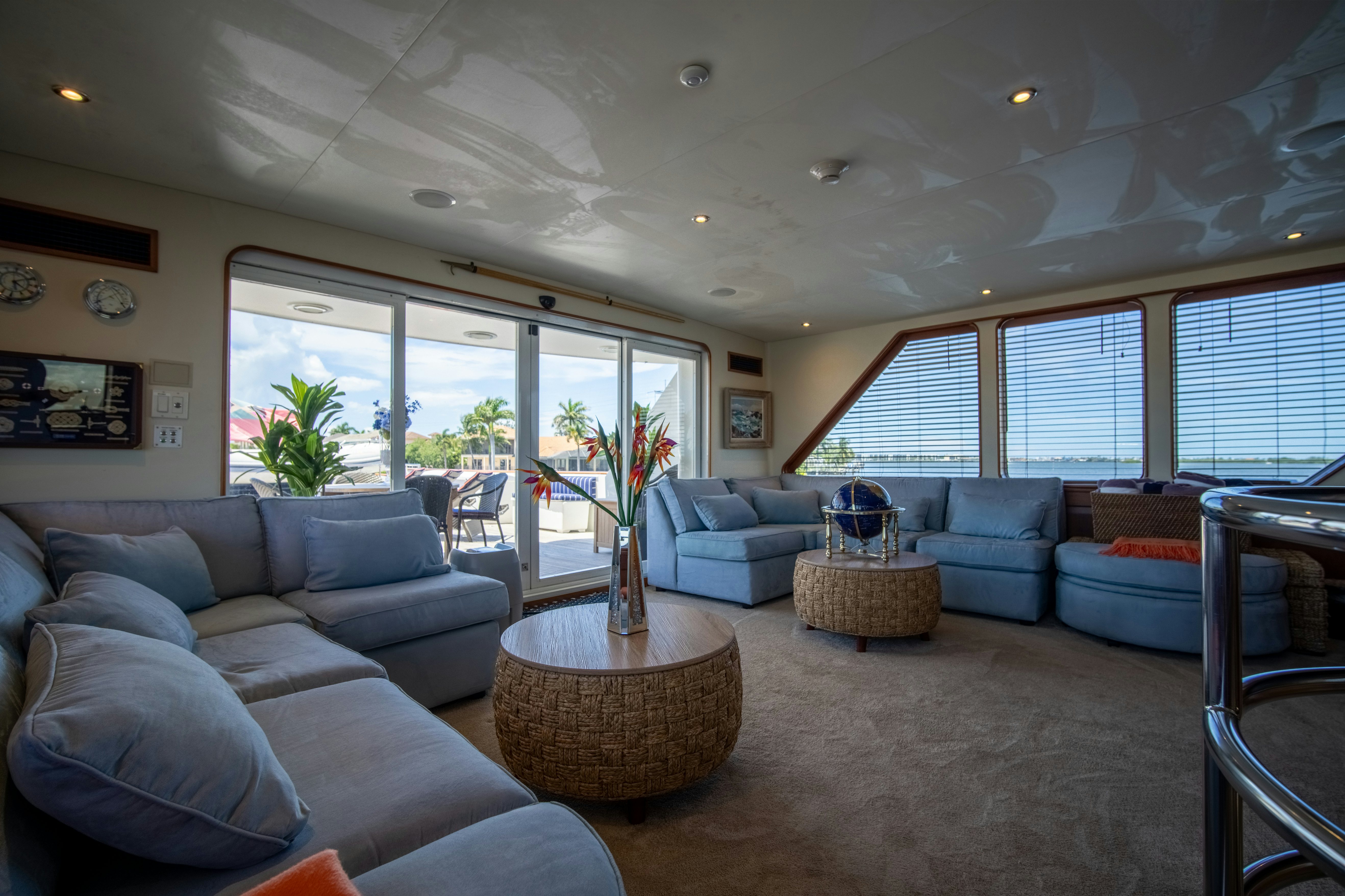 a living room with a large window aboard FLYING DUTCHMAN Yacht for Sale