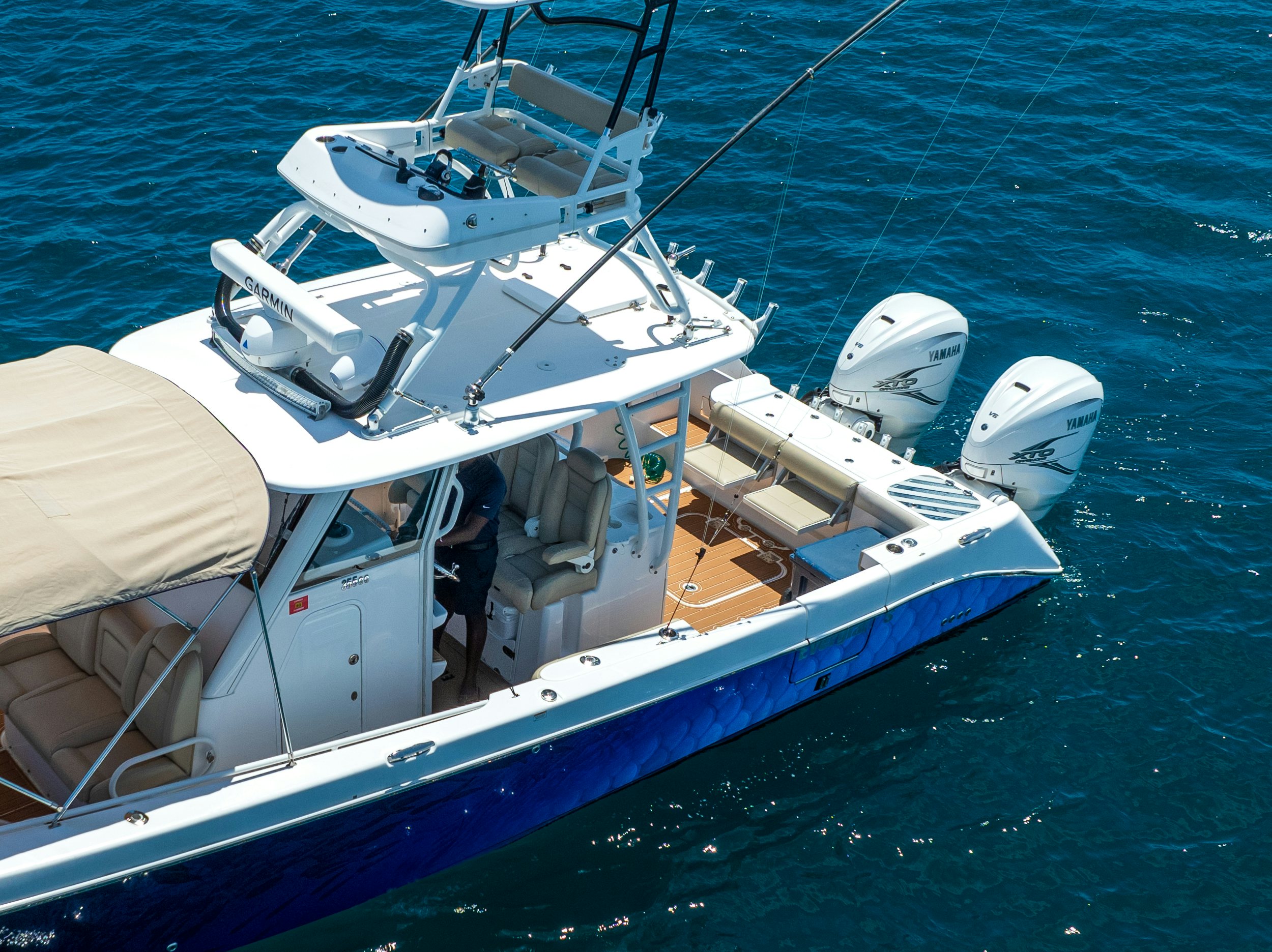 a boat with a person on it aboard LOVE ME TENDER Yacht for Sale