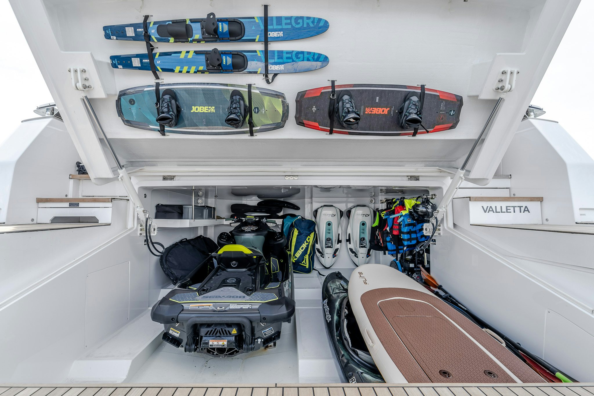 a group of race cars on a track aboard ISOTTA Yacht for Sale